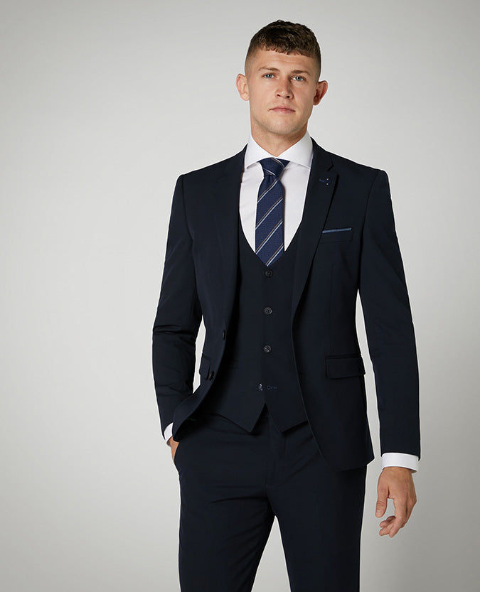 Man wearing a navy X-Slim Fit Stretch Mix and Match Suit