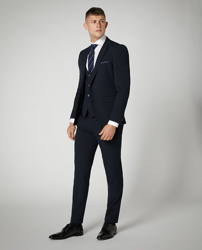 Man wearing a navy X-Slim Fit Stretch Mix and Match Suit