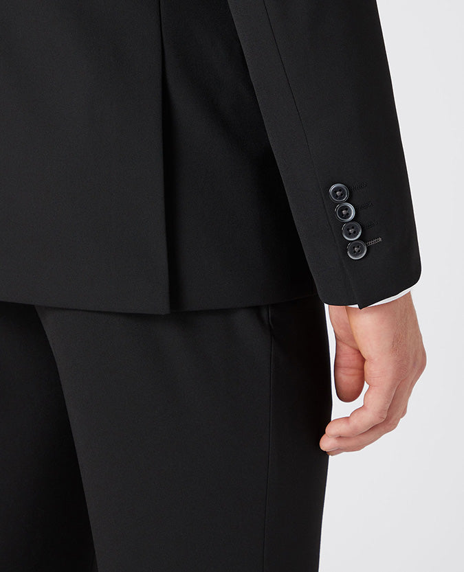 Man wearing a black Tapered Fit Stretch Mix and Match Suit