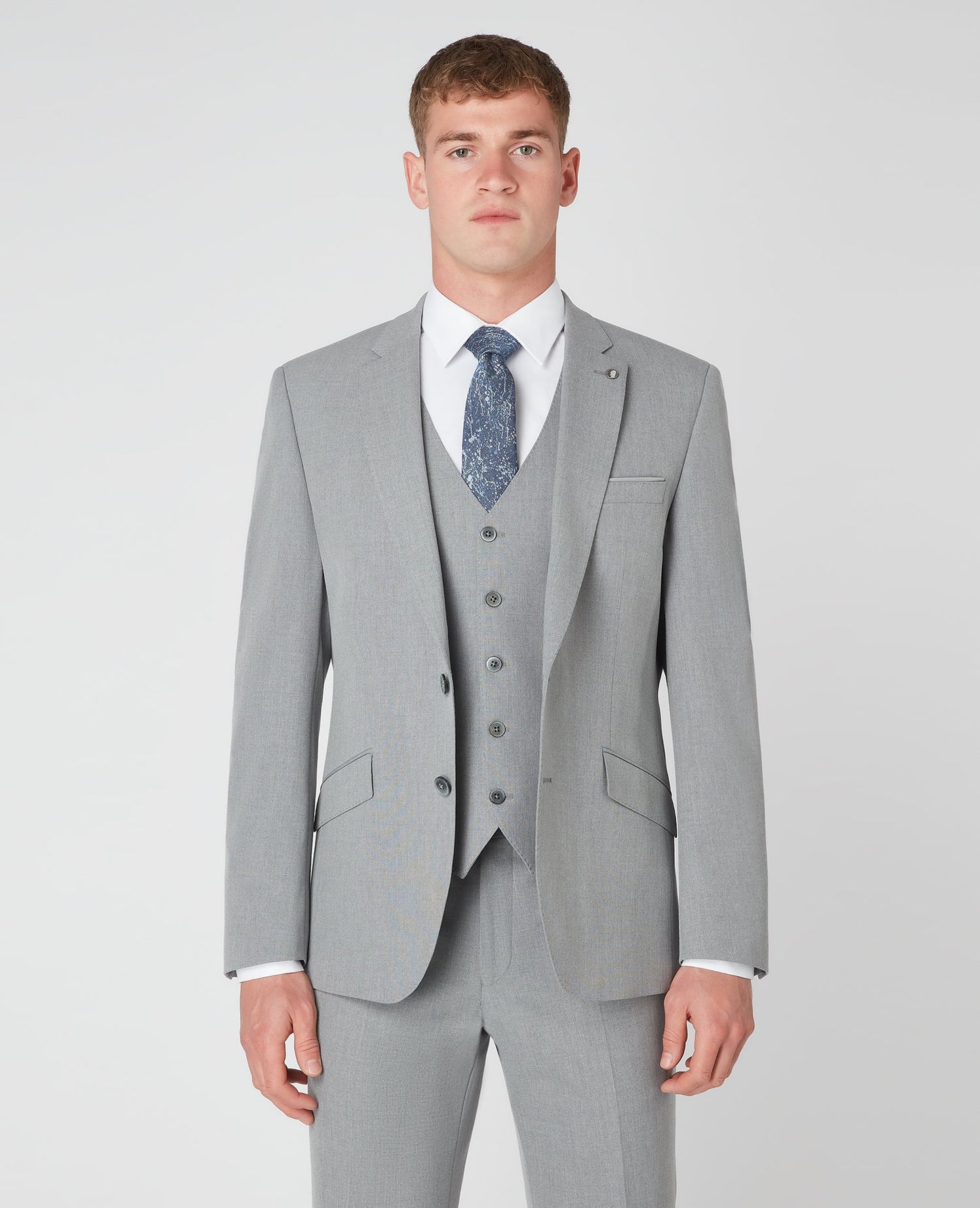 Man wearing a grey Tapered Fit Stretch Mix and Match Suit
