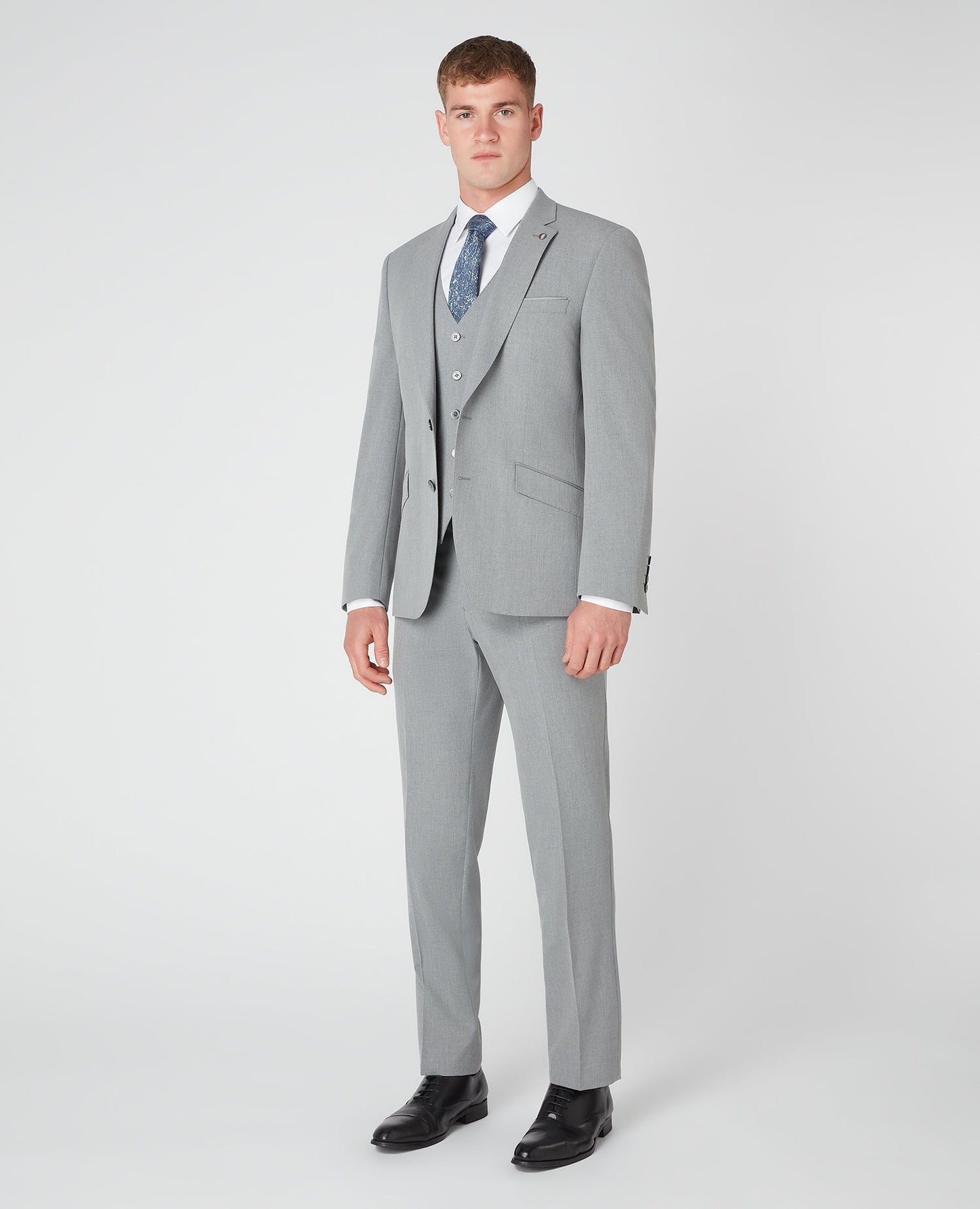 Man wearing a grey Tapered Fit Stretch Mix and Match Suit