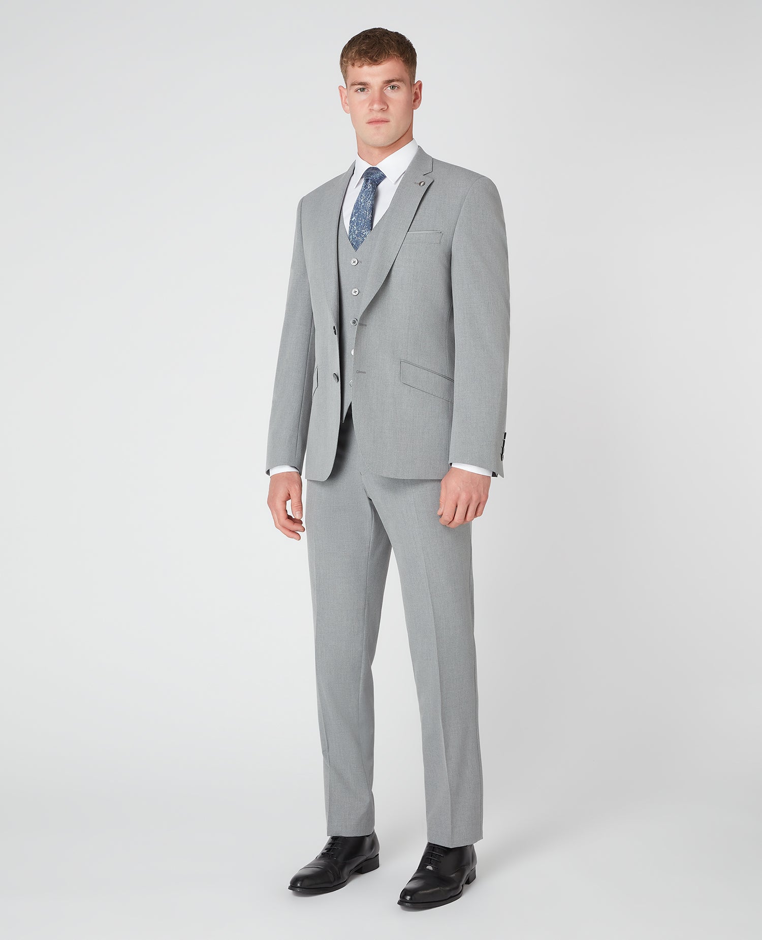 Man wearing a grey Tapered Fit Stretch Mix and Match Suit