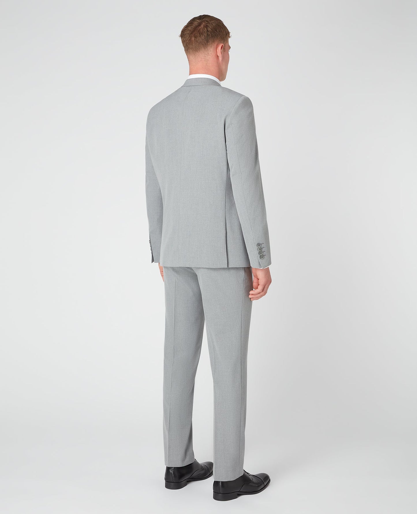 Man wearing a grey Tapered Fit Stretch Mix and Match Suit