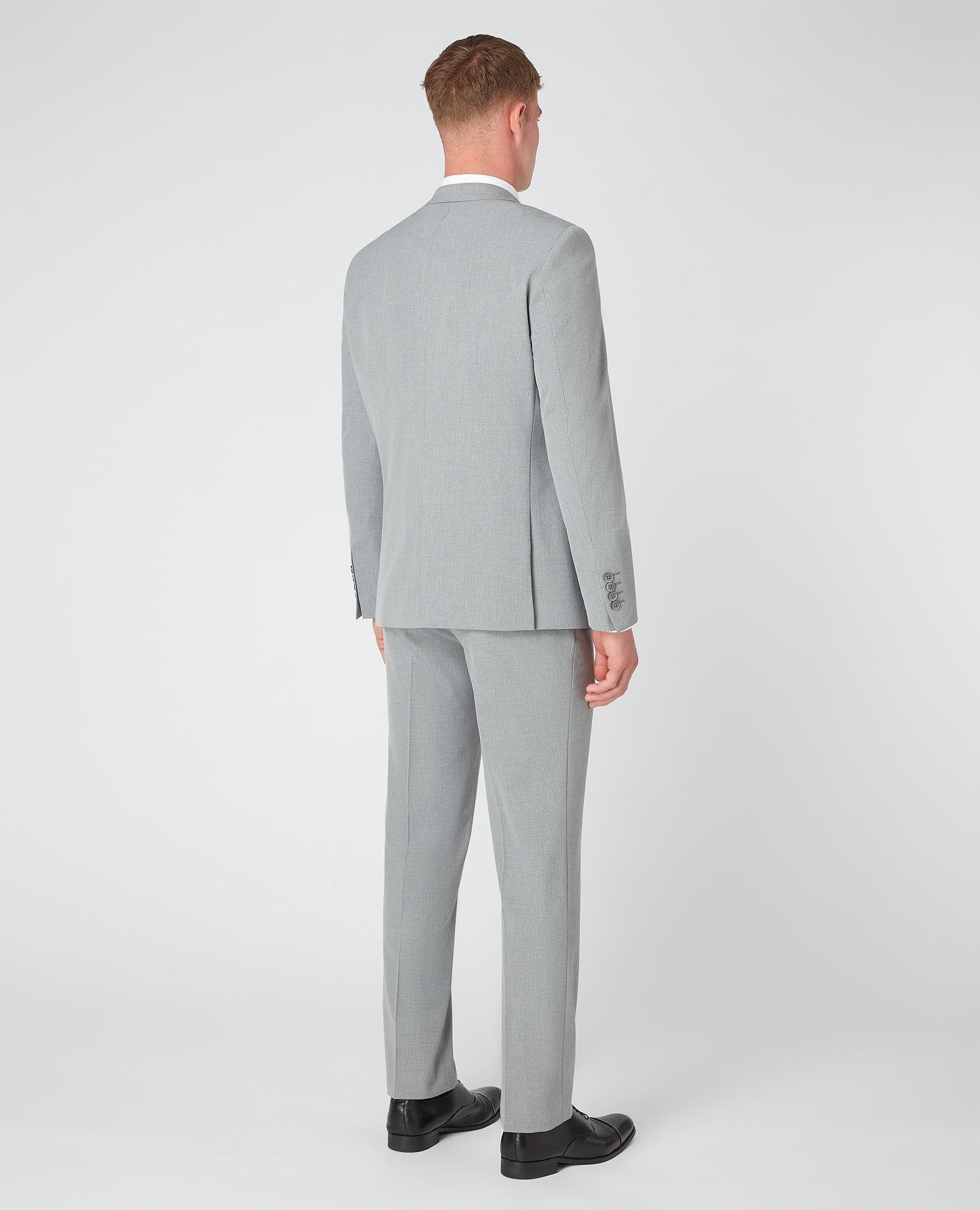 Man wearing a grey Tapered Fit Stretch Mix and Match Suit