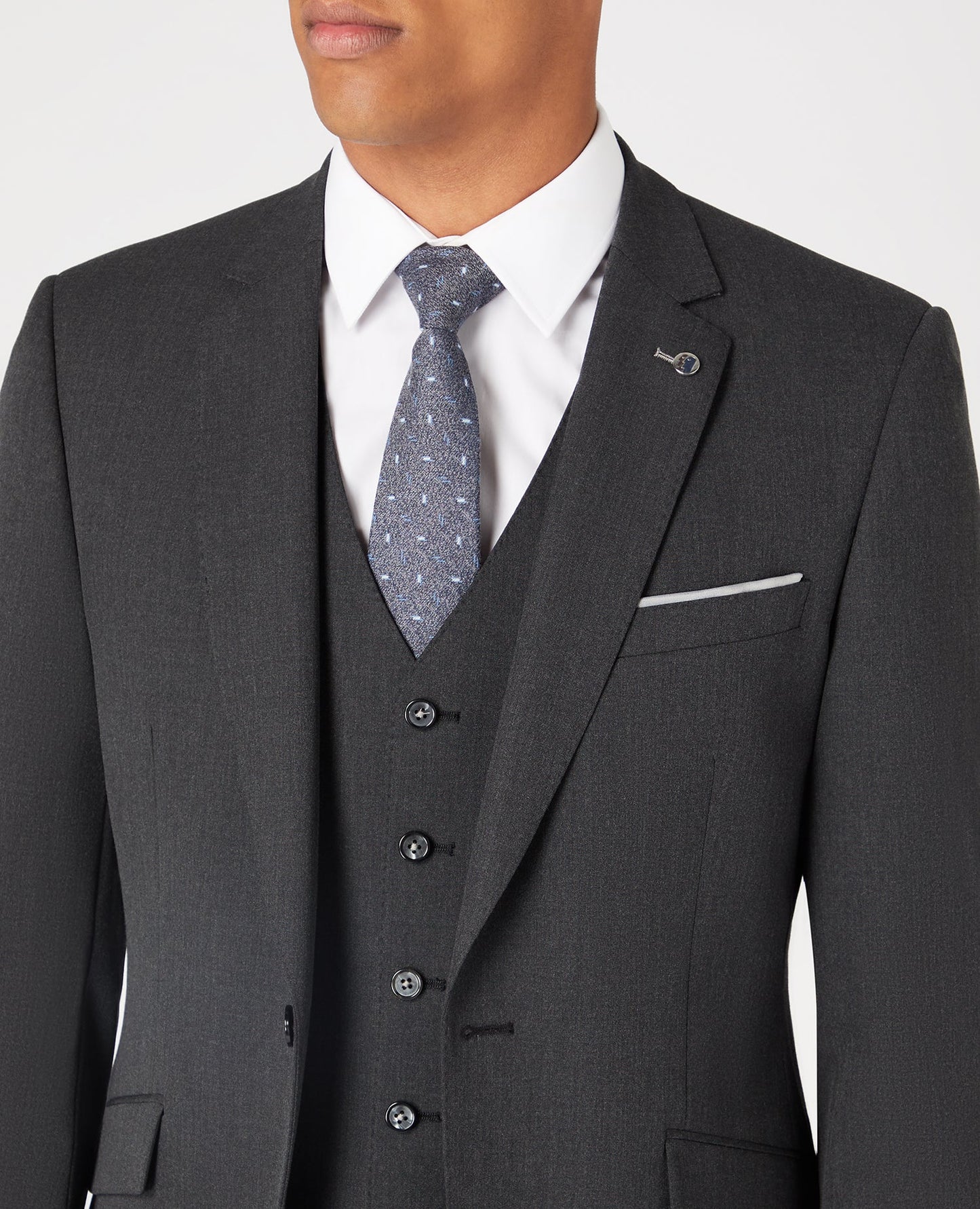 Man wearing a grey Tapered Fit Stretch Mix and Match Suit Jacket