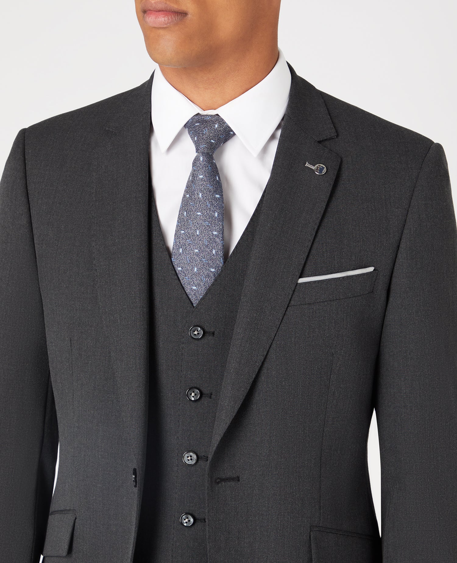 Man wearing a grey Tapered Fit Stretch Mix and Match Suit Jacket