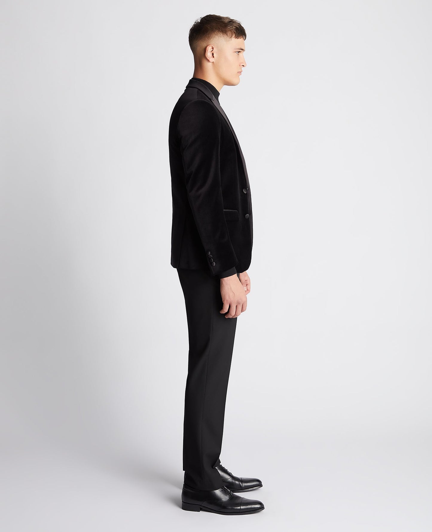 Man wearing a black Slim Fit Velvet Jacket