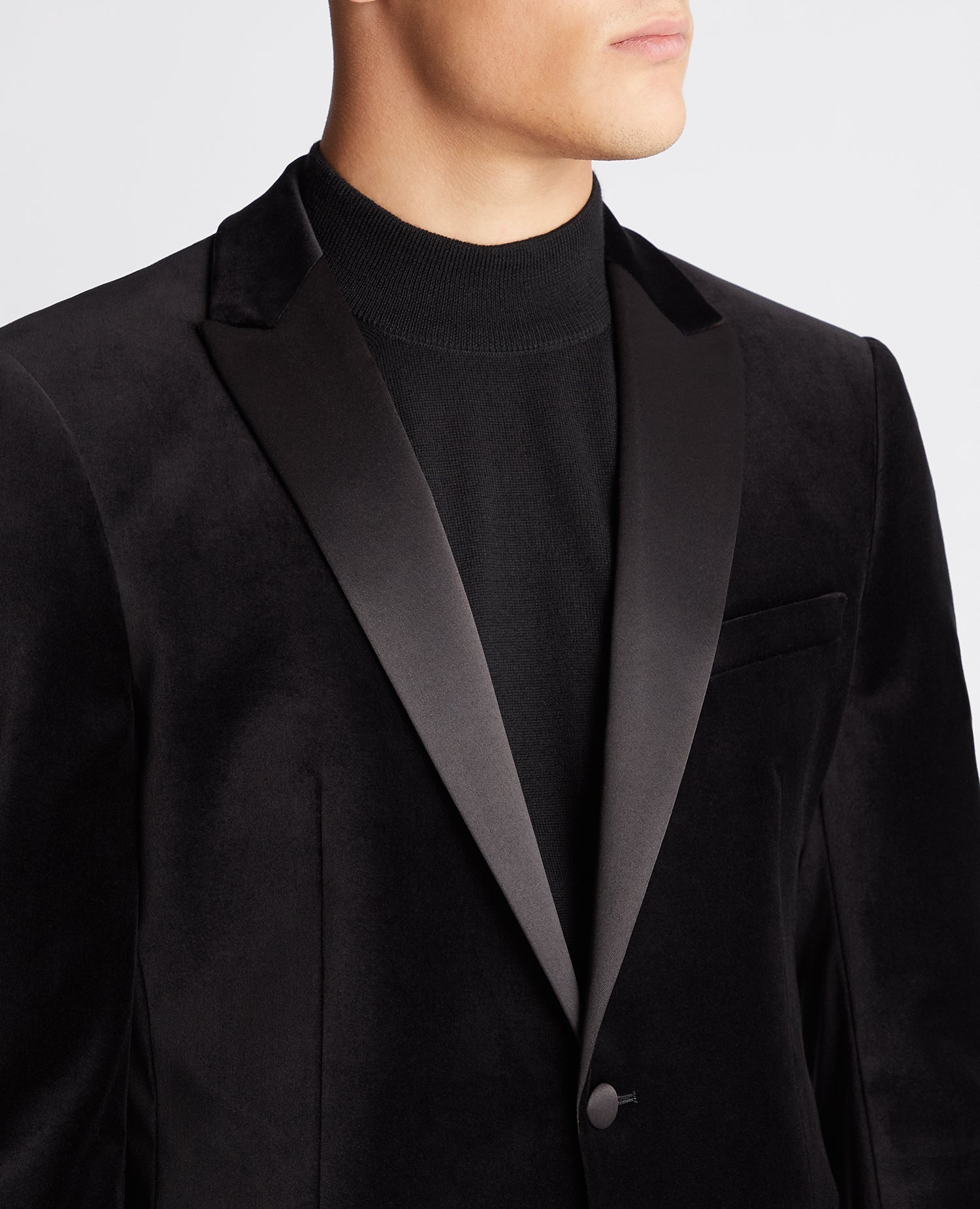 Man wearing a black Slim Fit Velvet Jacket
