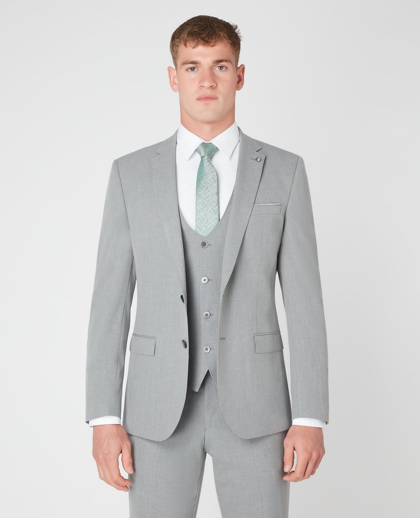 Man wearing a grey Slim Fit Stretch Mix and Match Suit Jacket