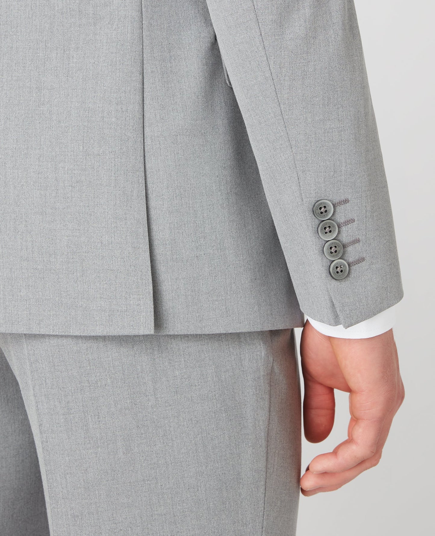 Man wearing a grey Slim Fit Stretch Mix and Match Suit Jacket