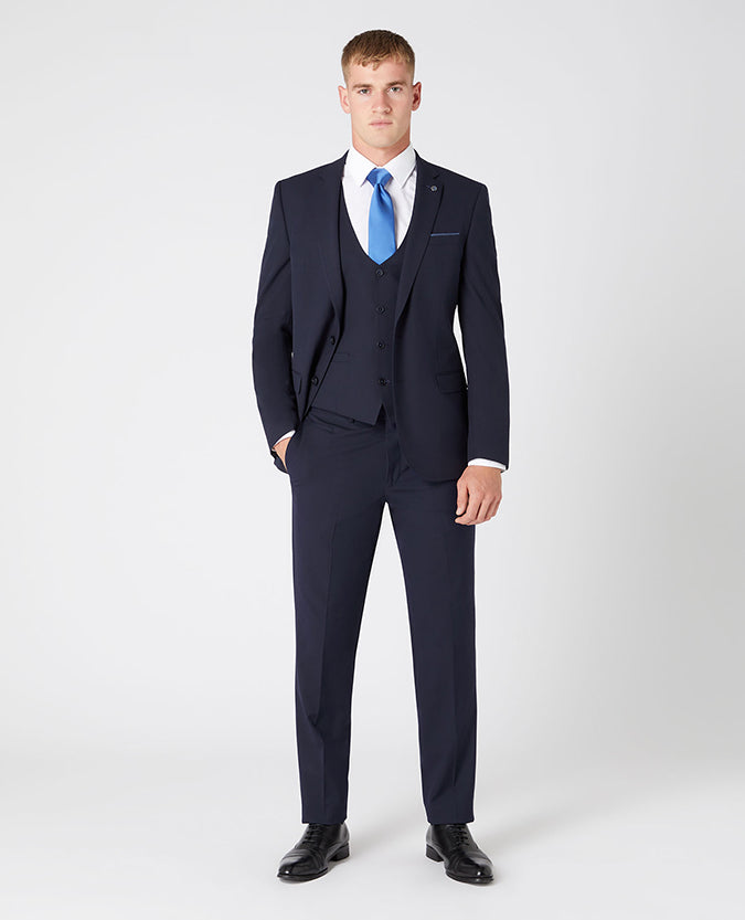 Man wearing a navy Slim Fit Stretch Mix and Match Suit