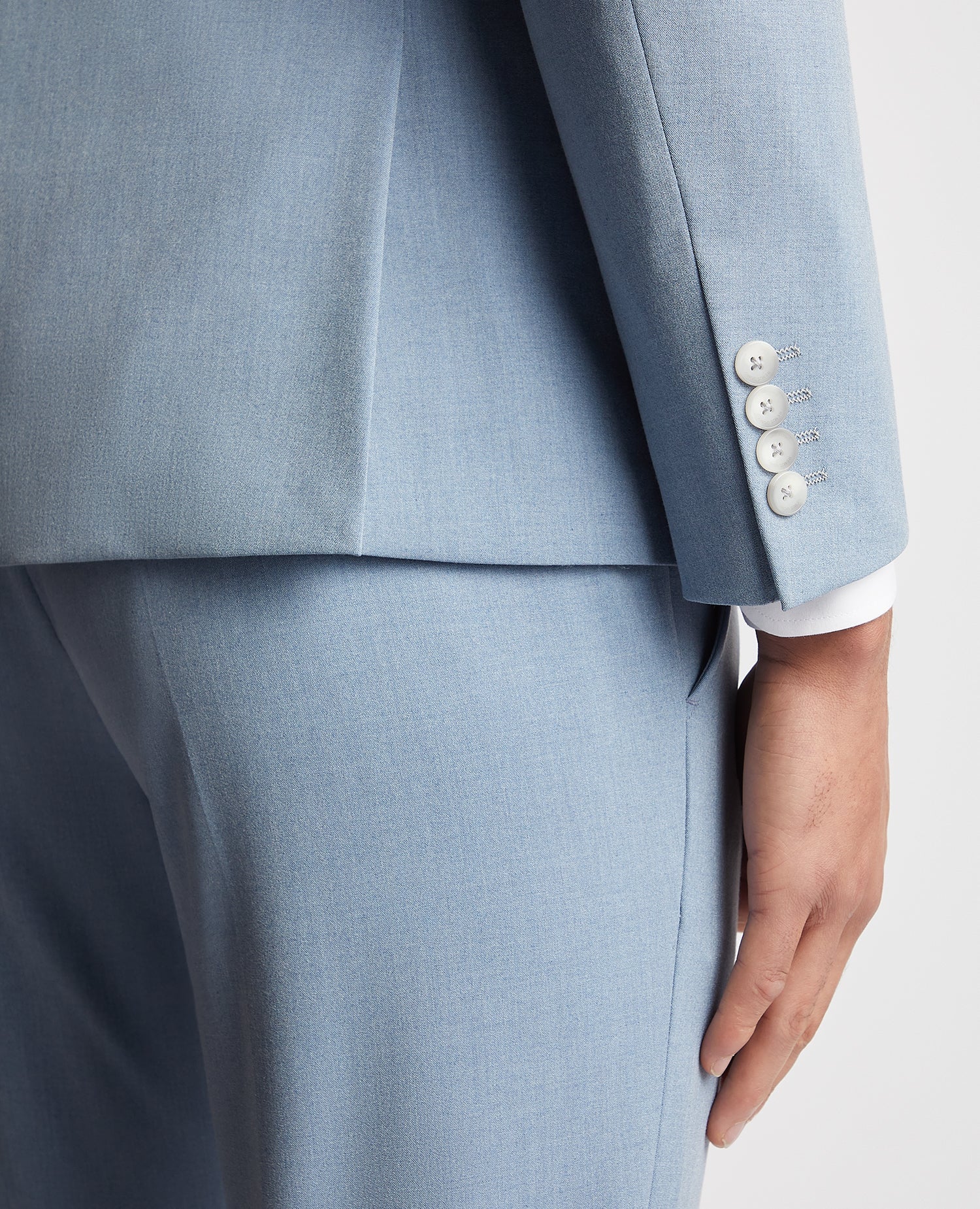 Man wearing a blue Slim Fit Stretch Suit Jacket