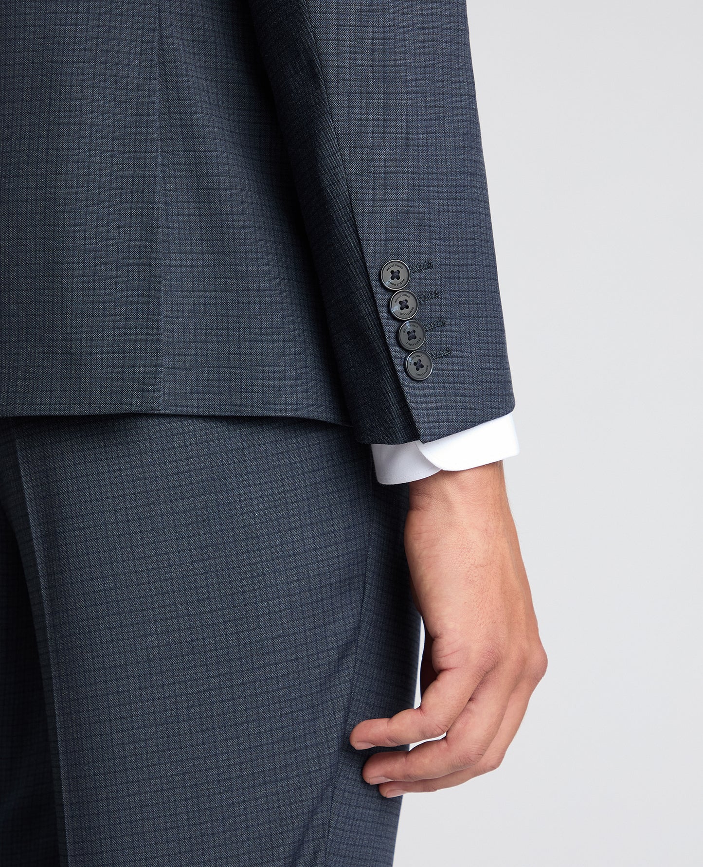 Man wearing a blue Slim Fit Checked Stretch Suit