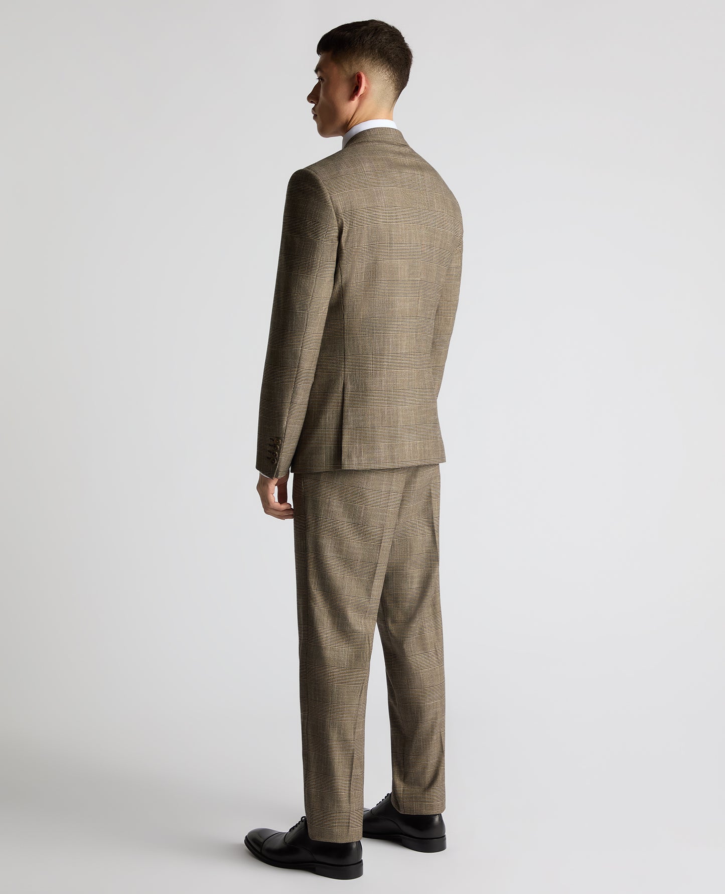 Man wearing a sand Slim Fit Double Breasted Suit Jacket