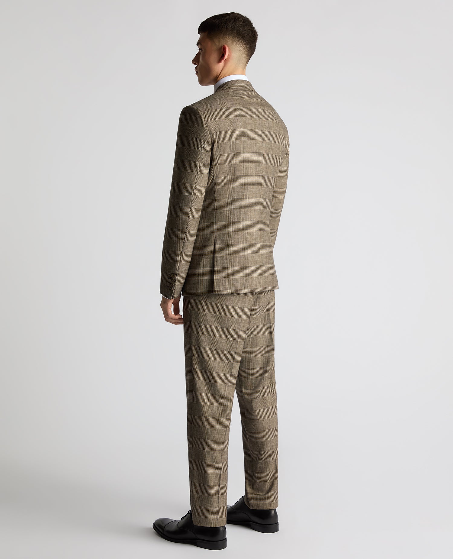 Man wearing a sand Slim Fit Double Breasted Suit Jacket