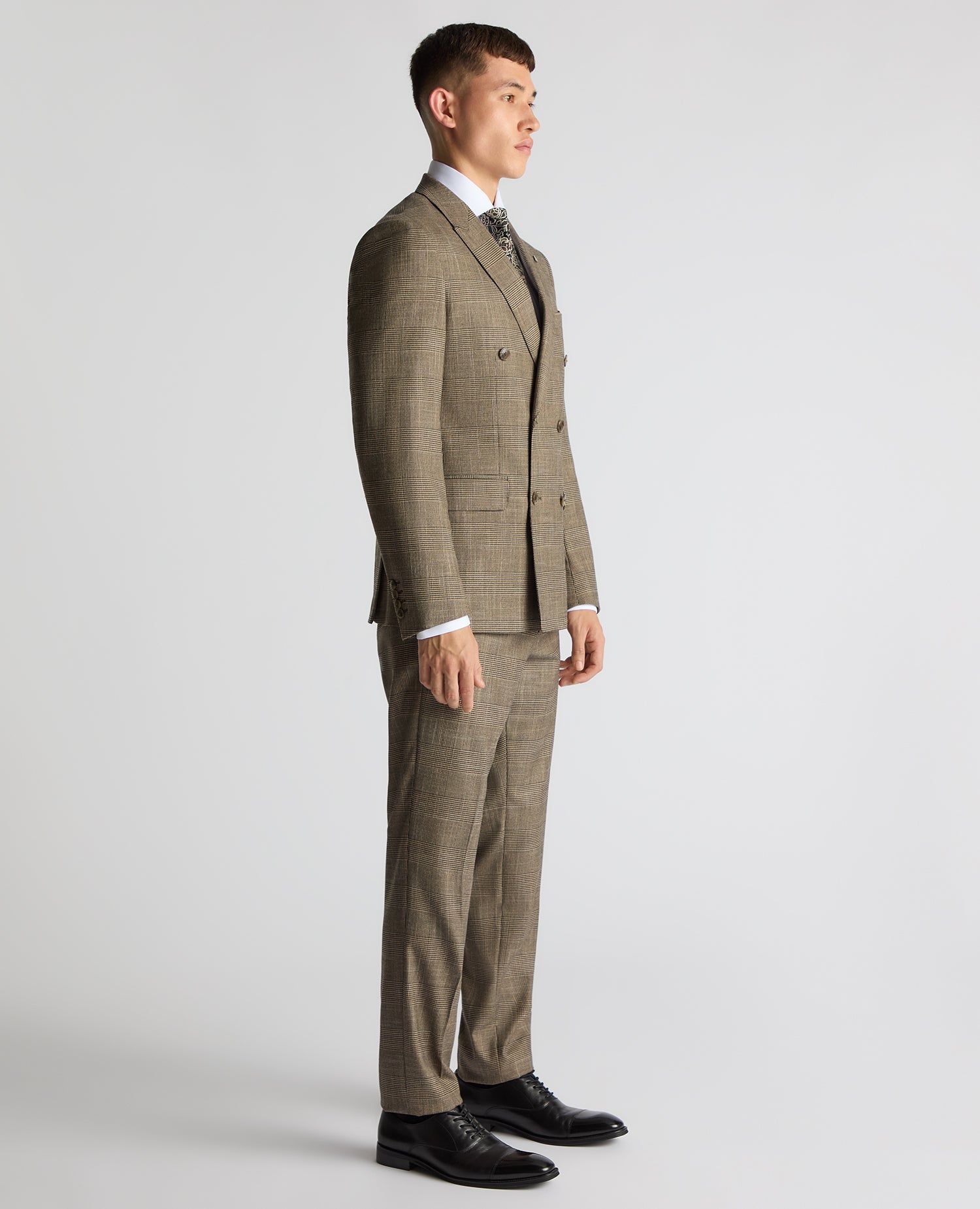 Man wearing a sand Slim Fit Double Breasted Suit Jacket