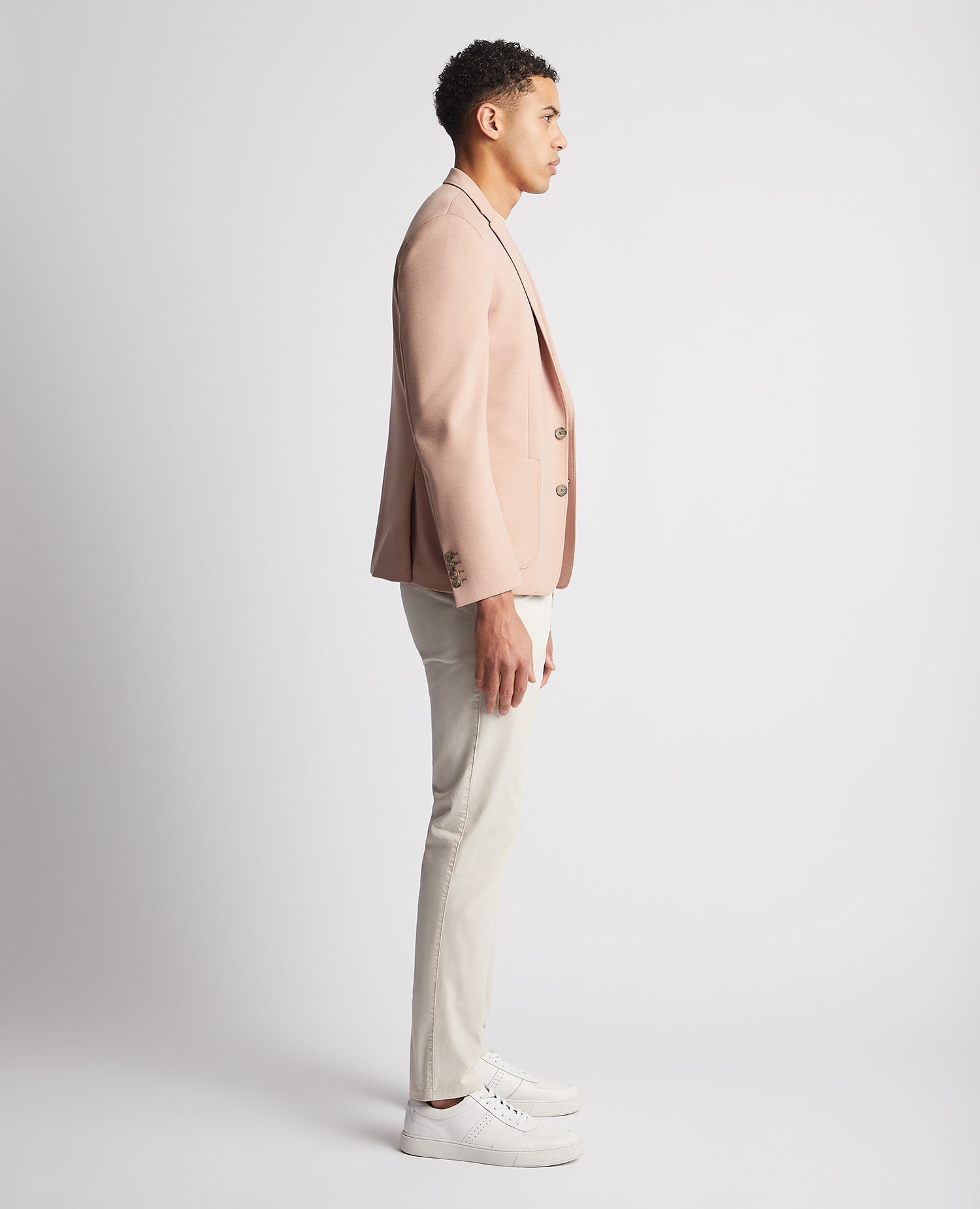 Man wearing a red Slim Fit Jersey Stretch Jacket