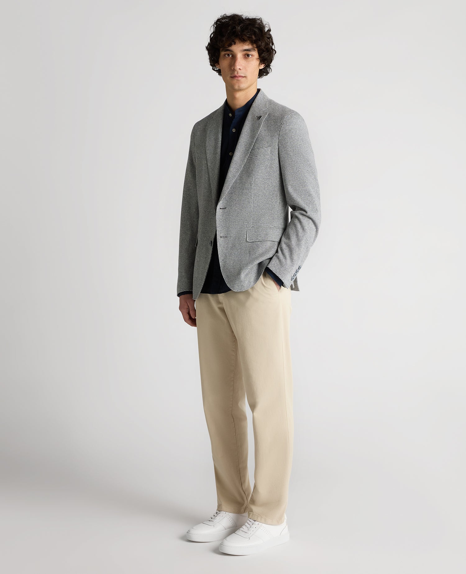 Man wearing a blue Slim Fit Cotton-Blend Stretch Jacket