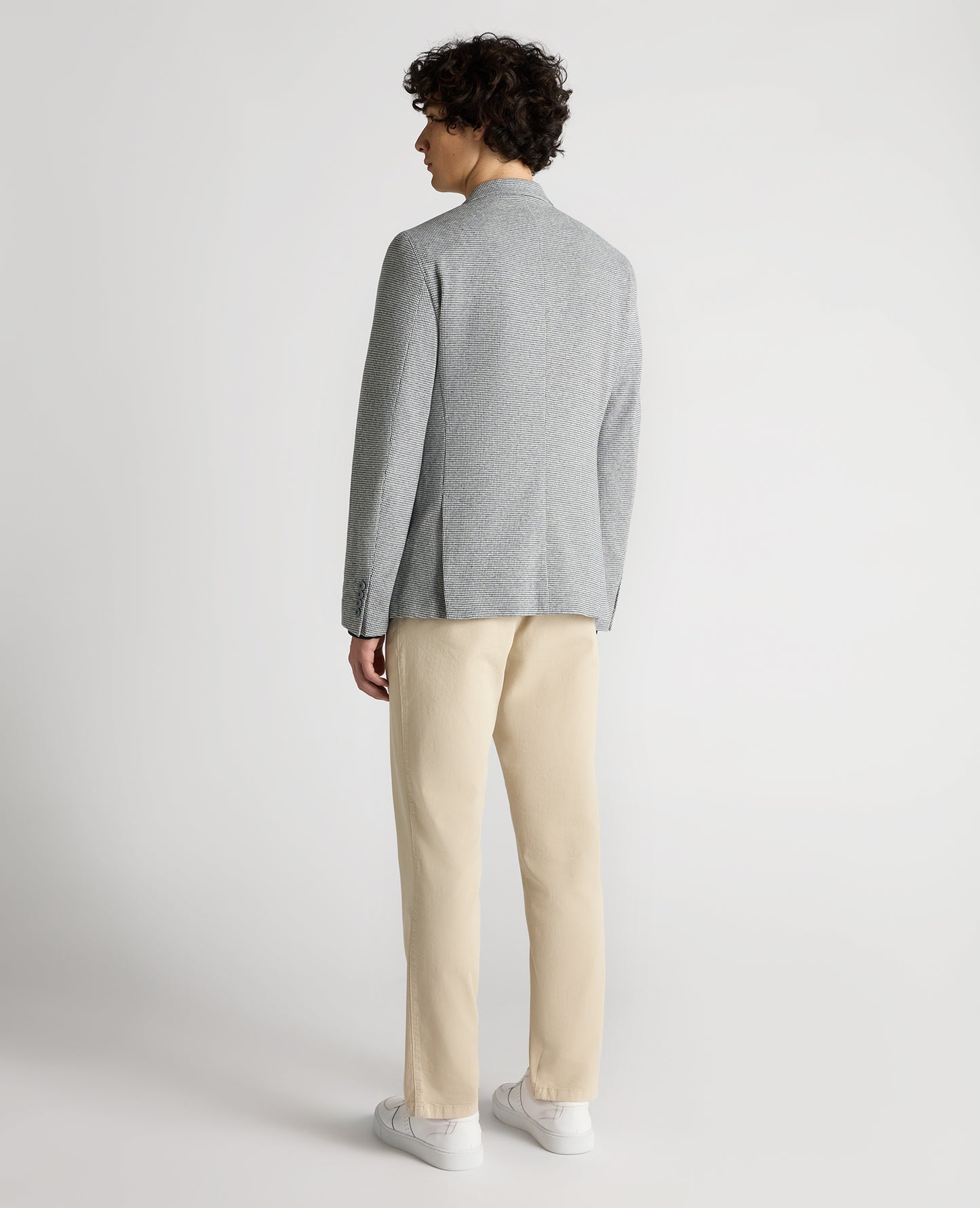 Man wearing a blue Slim Fit Cotton-Blend Stretch Jacket