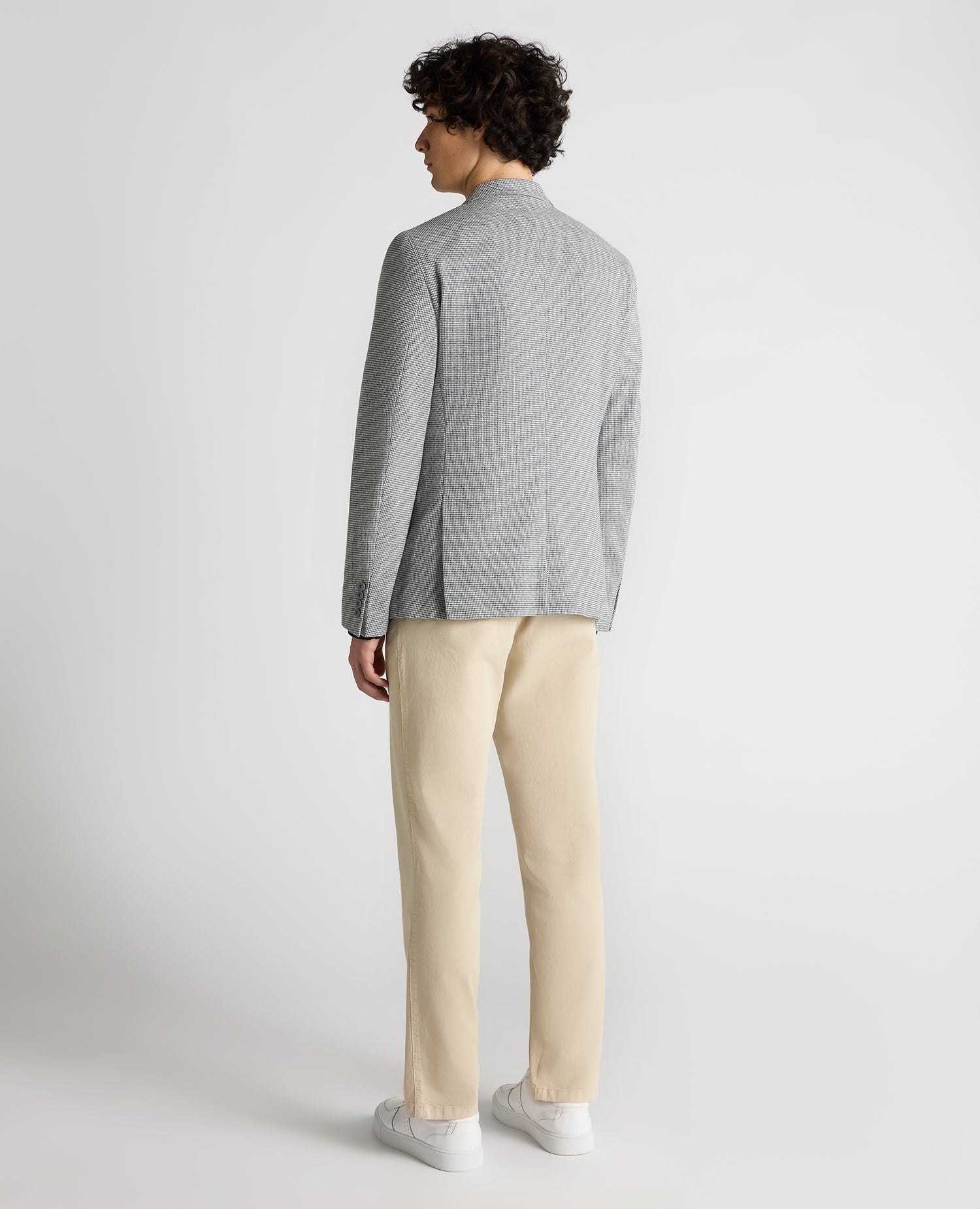 Man wearing a blue Slim Fit Cotton-Blend Stretch Jacket