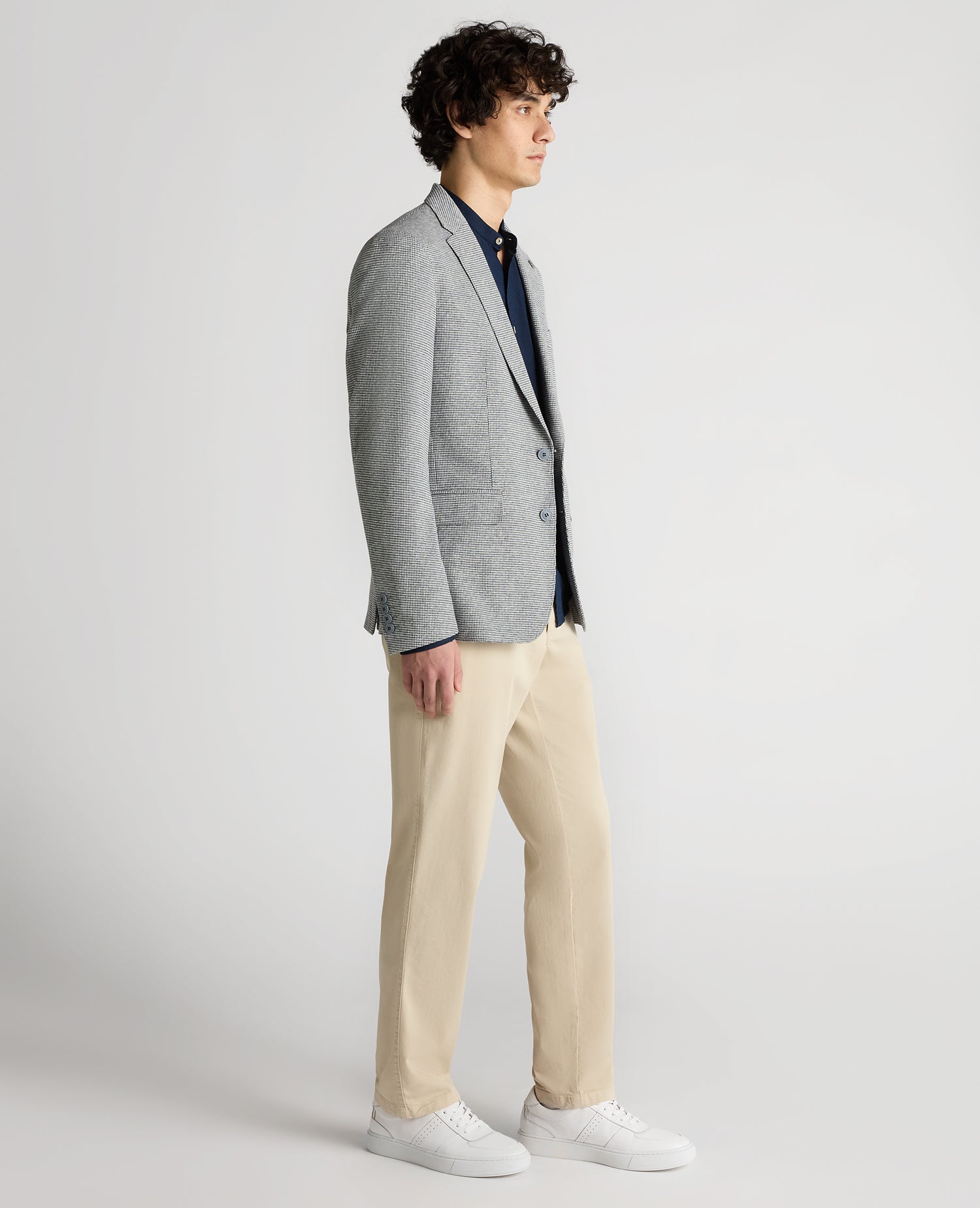 Man wearing a blue Slim Fit Cotton-Blend Stretch Jacket