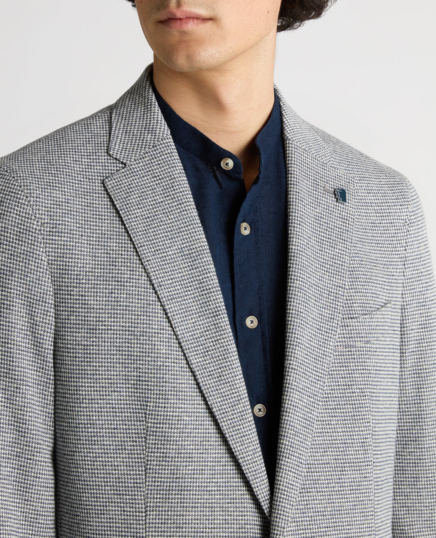 Man wearing a blue Slim Fit Cotton-Blend Stretch Jacket