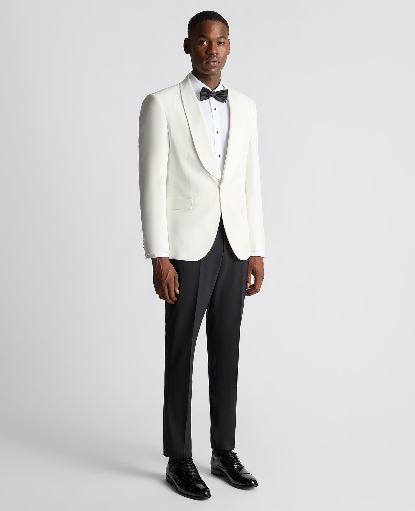Man wearing a white Slim Fit Dinner Jacket