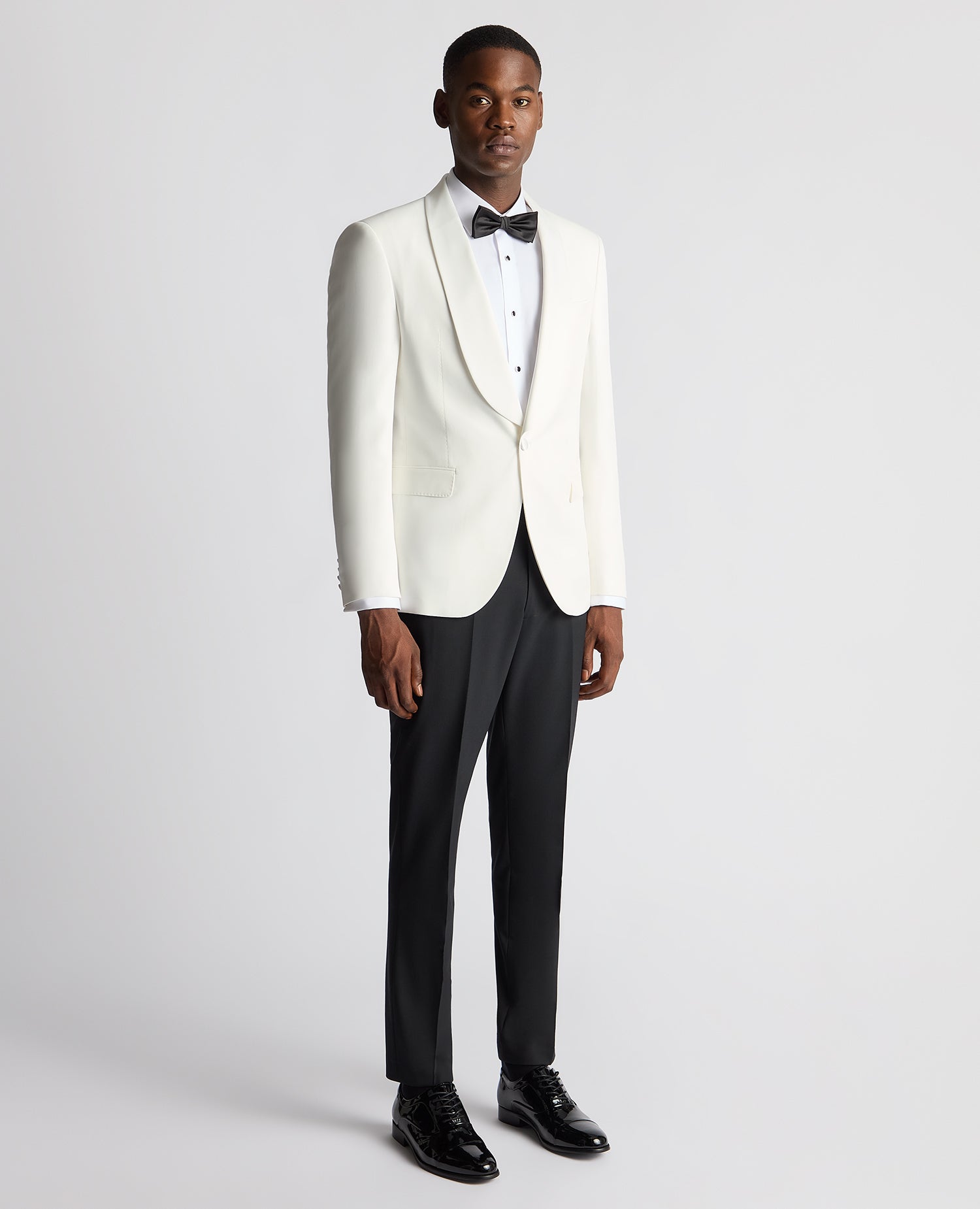 Man wearing a white Slim Fit Dinner Jacket