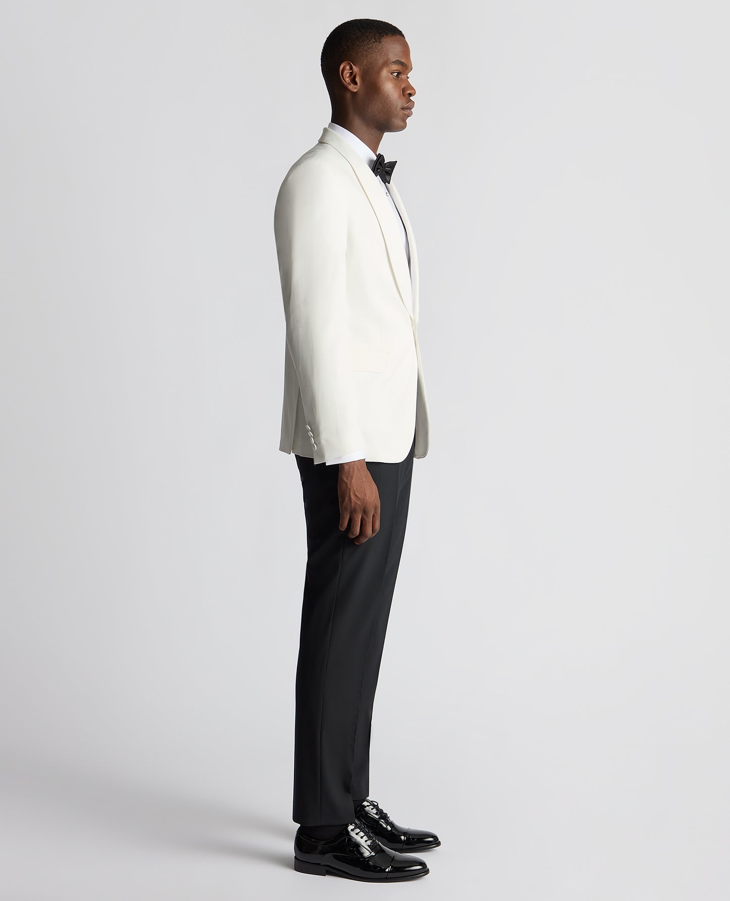 Man wearing a white Slim Fit Dinner Jacket