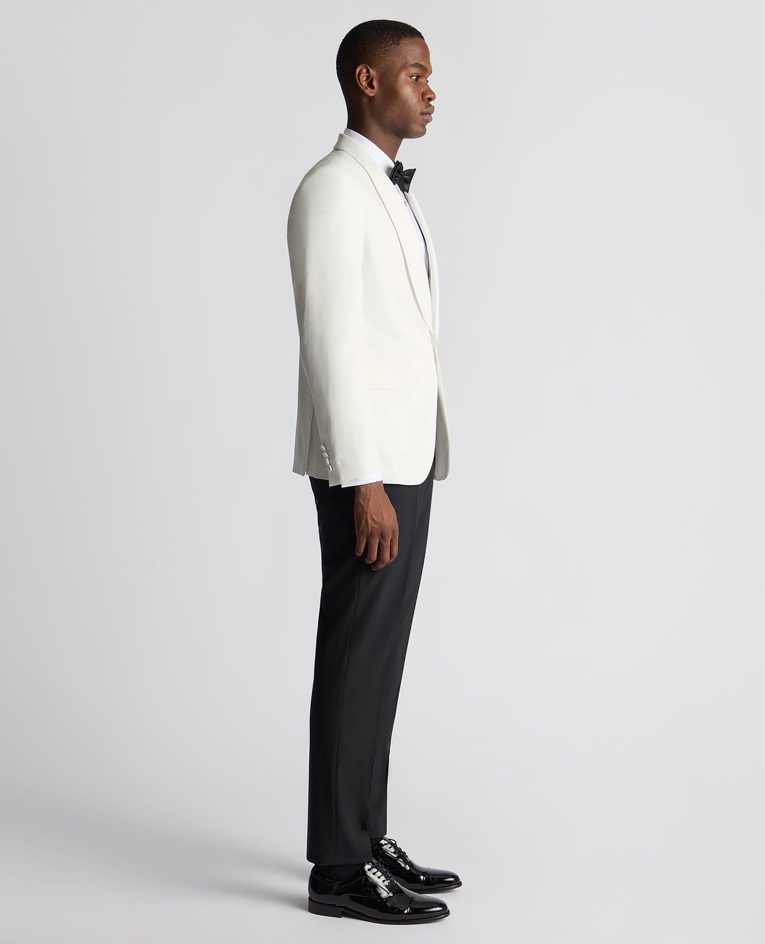 Man wearing a white Slim Fit Dinner Jacket
