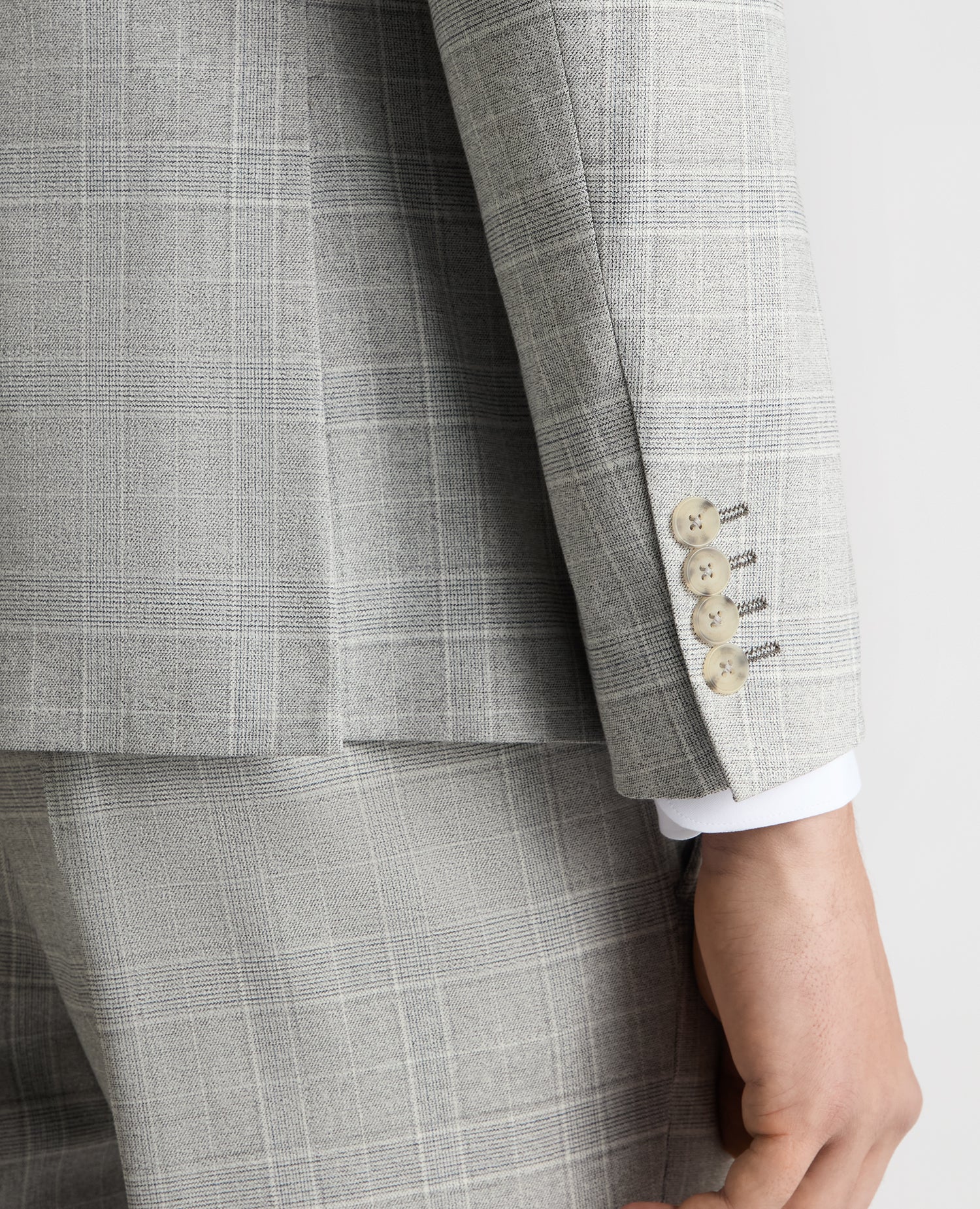 Man wearing a grey Slim Fit Checked Stretch Suit