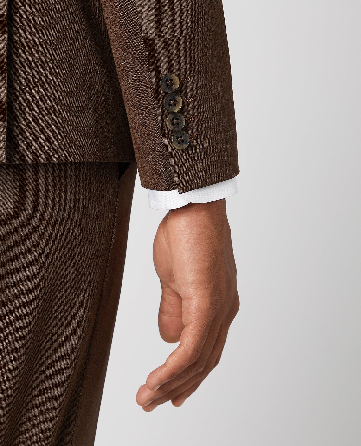 Man wearing a brown X-Slim Fit 2-Piece Stretch Suit