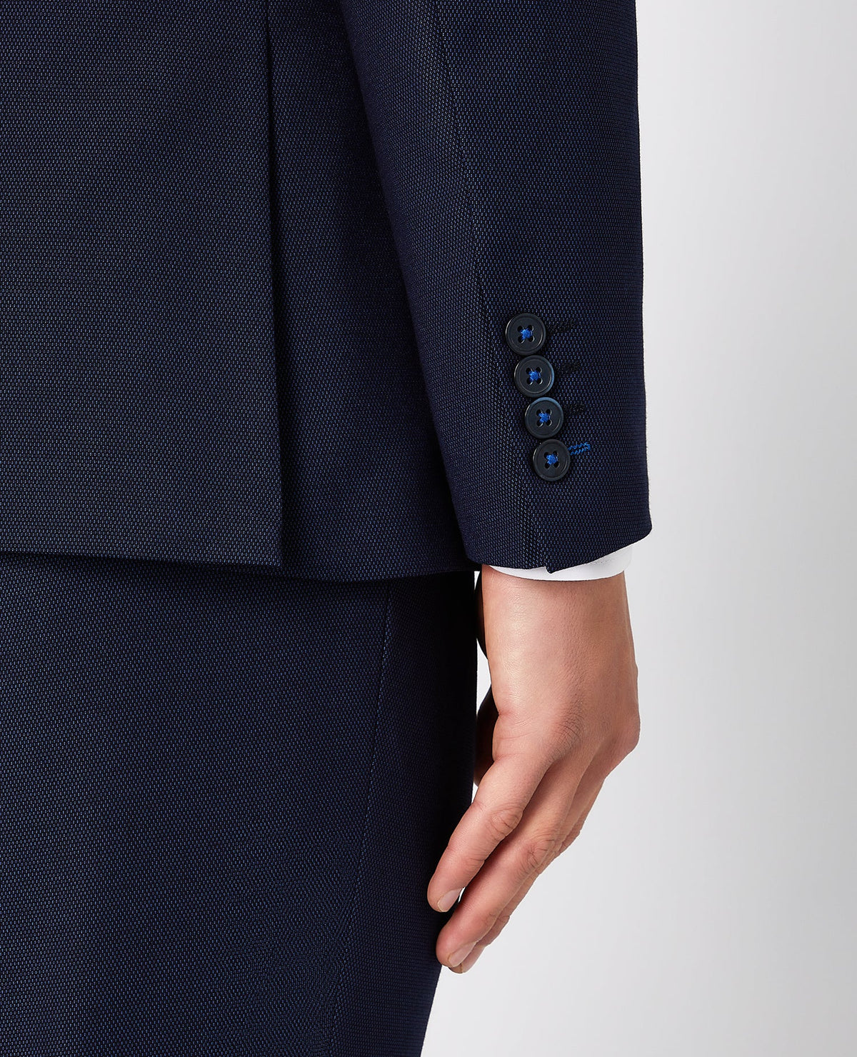Man wearing a blue X-Slim Fit Stretch 3 Piece Suit