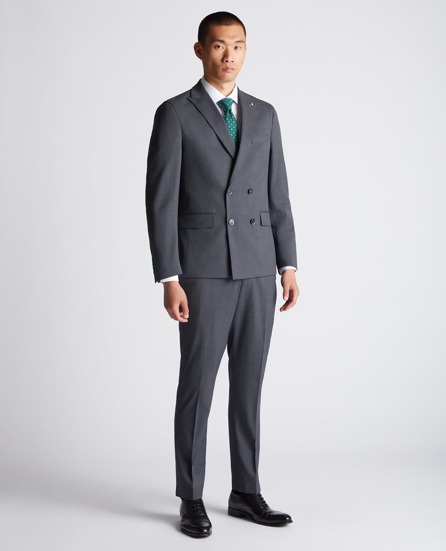 Man wearing a grey Slim Fit Wool-Rich Mix and Match Suit