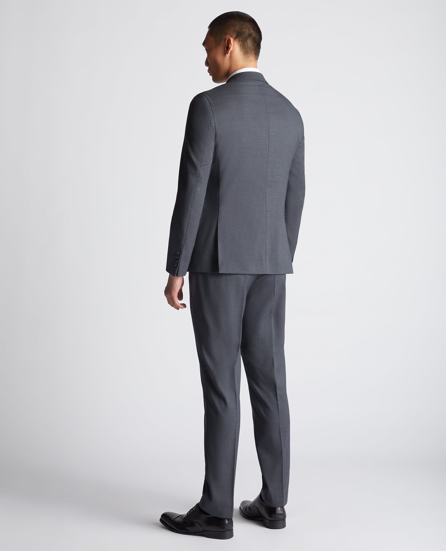 Man wearing a grey Slim Fit Wool-Rich Mix and Match Suit