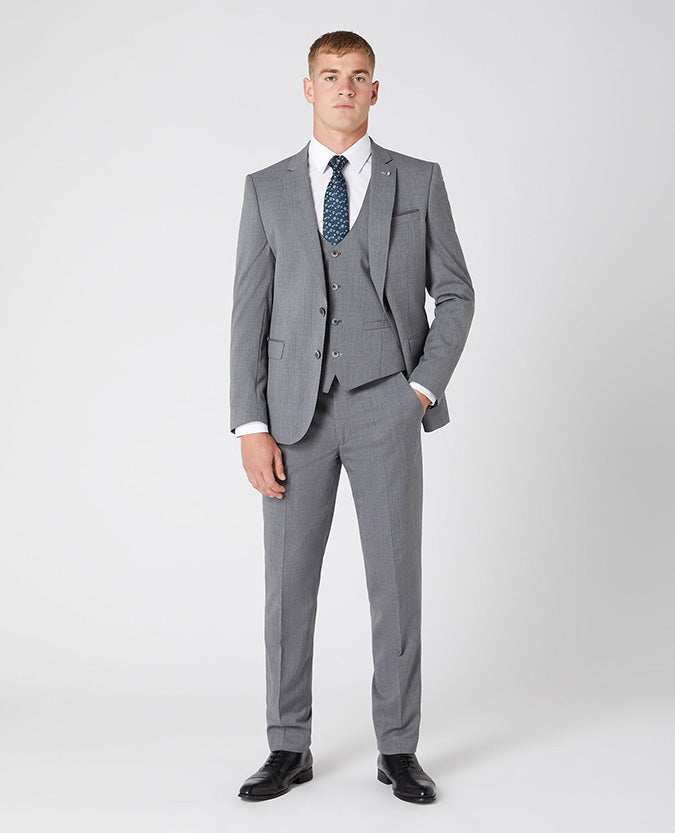 Man wearing a grey Slim Fit Wool-Blend Stretch Mix and Match Suit Jacket