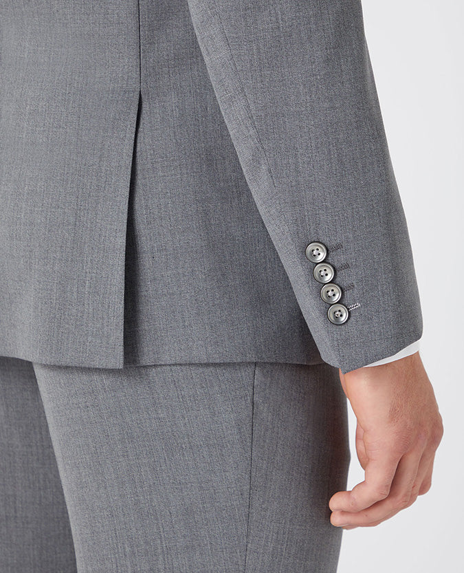 Man wearing a grey Tapered Fit Wool-Blend Stretch Mix and Match Suit
