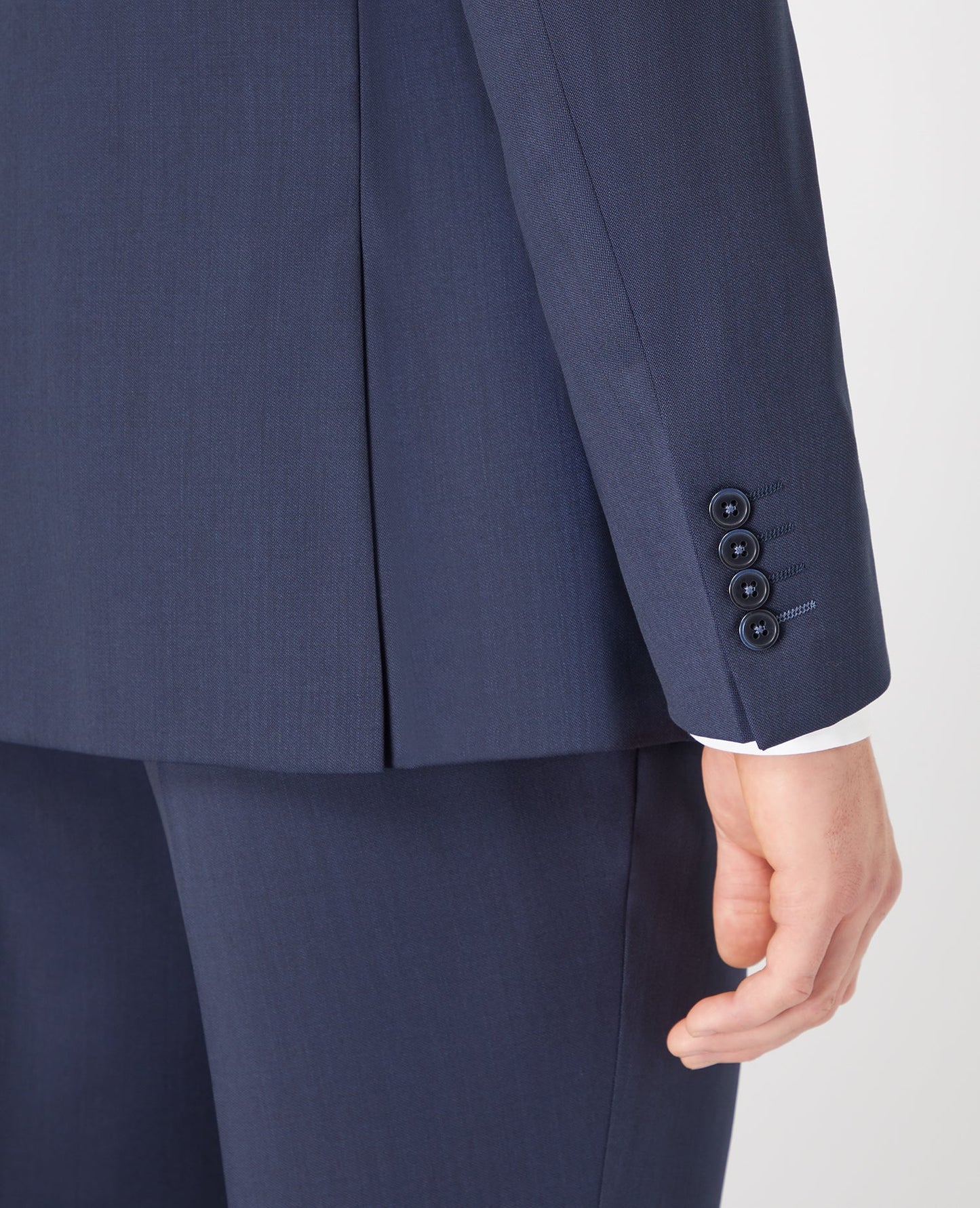 Man wearing a navy Tapered Fit Wool-Blend Mix and Match Suit