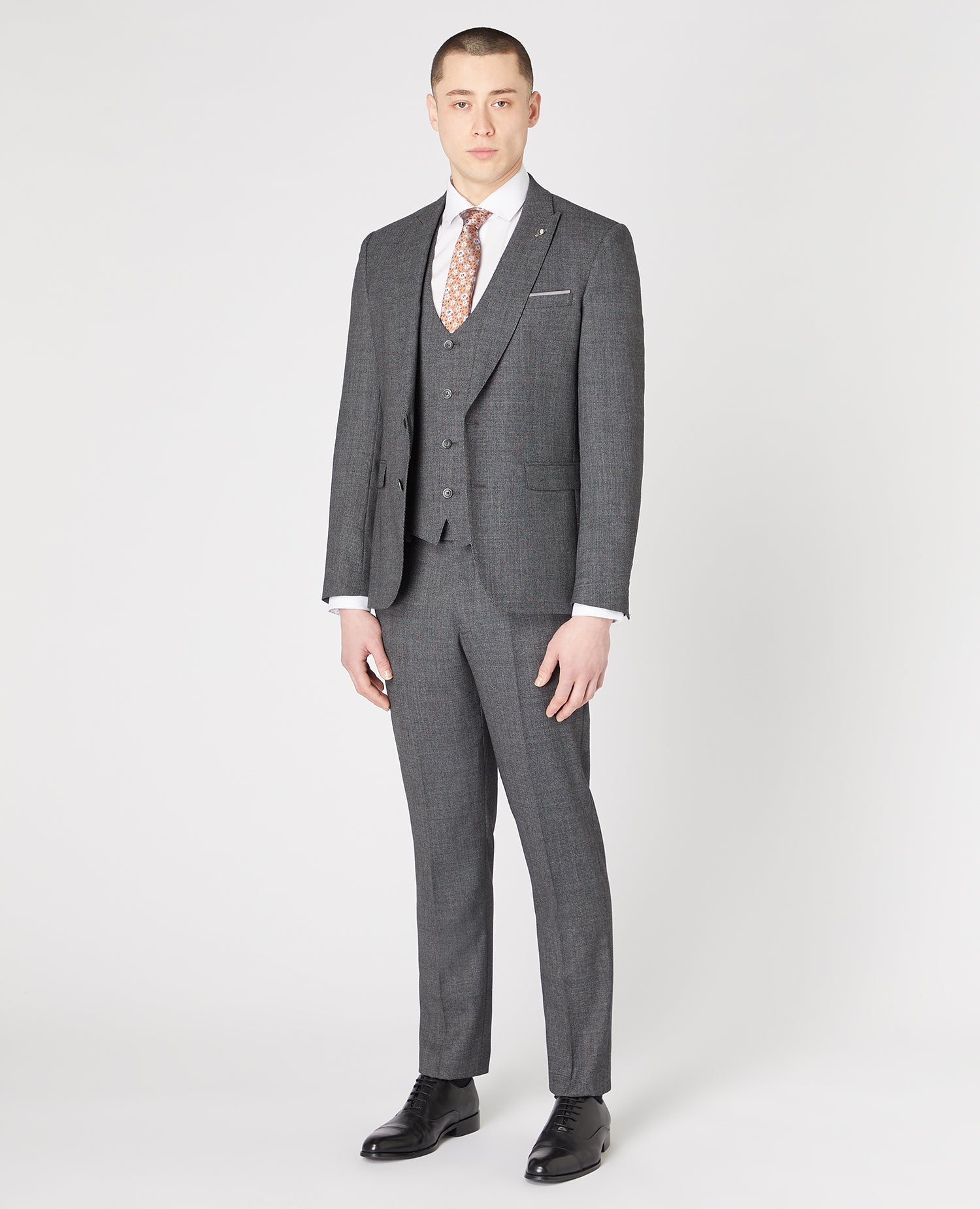 Man wearing a grey Slim Fit Wool-Rich Stretch Mix and Match Suit