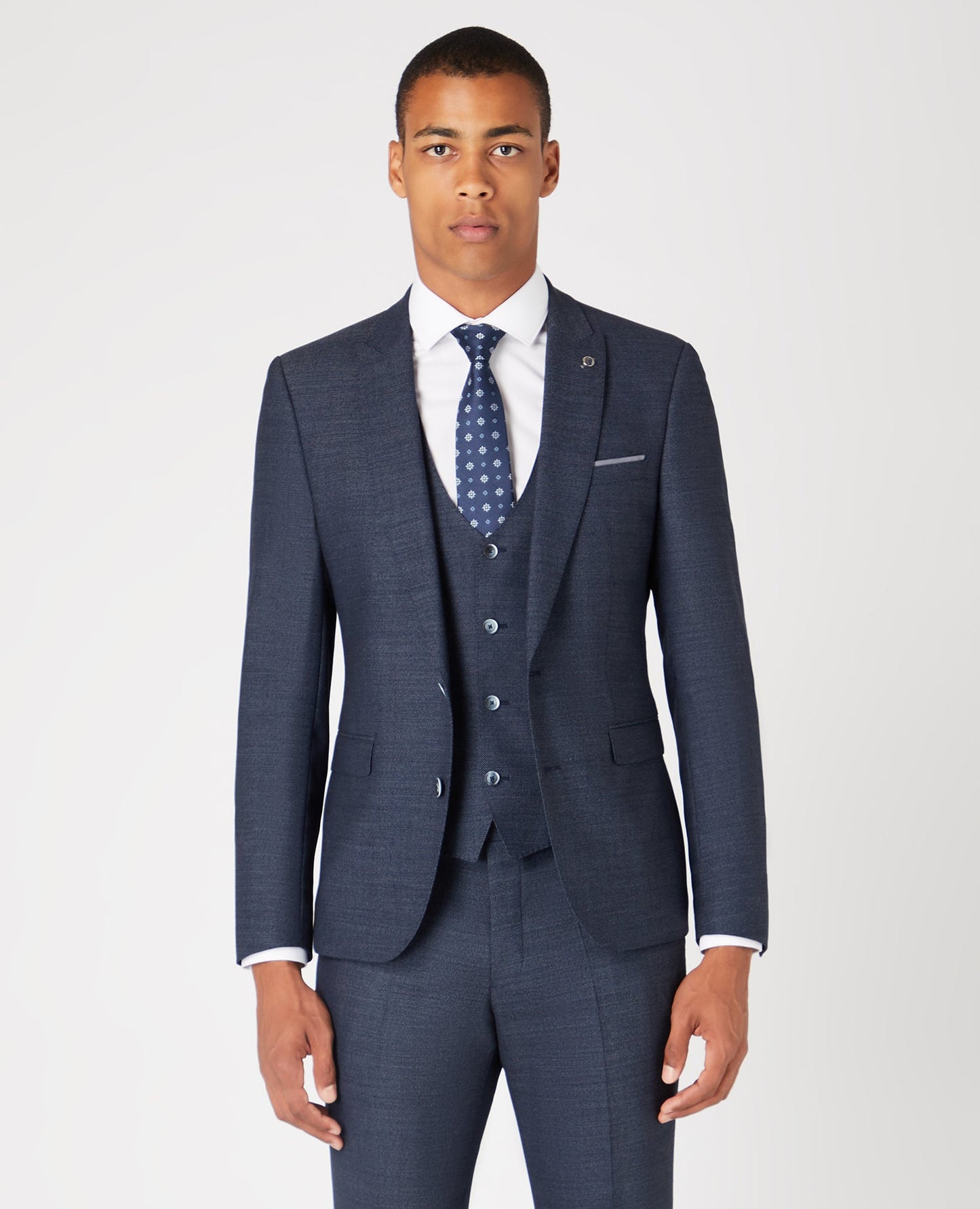 Man wearing a blue Slim Fit Wool-Rich Mix and Match Suit