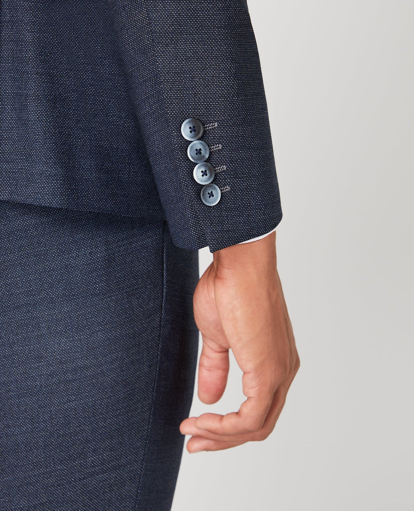 Man wearing a blue Slim Fit Wool-Rich Mix and Match Suit