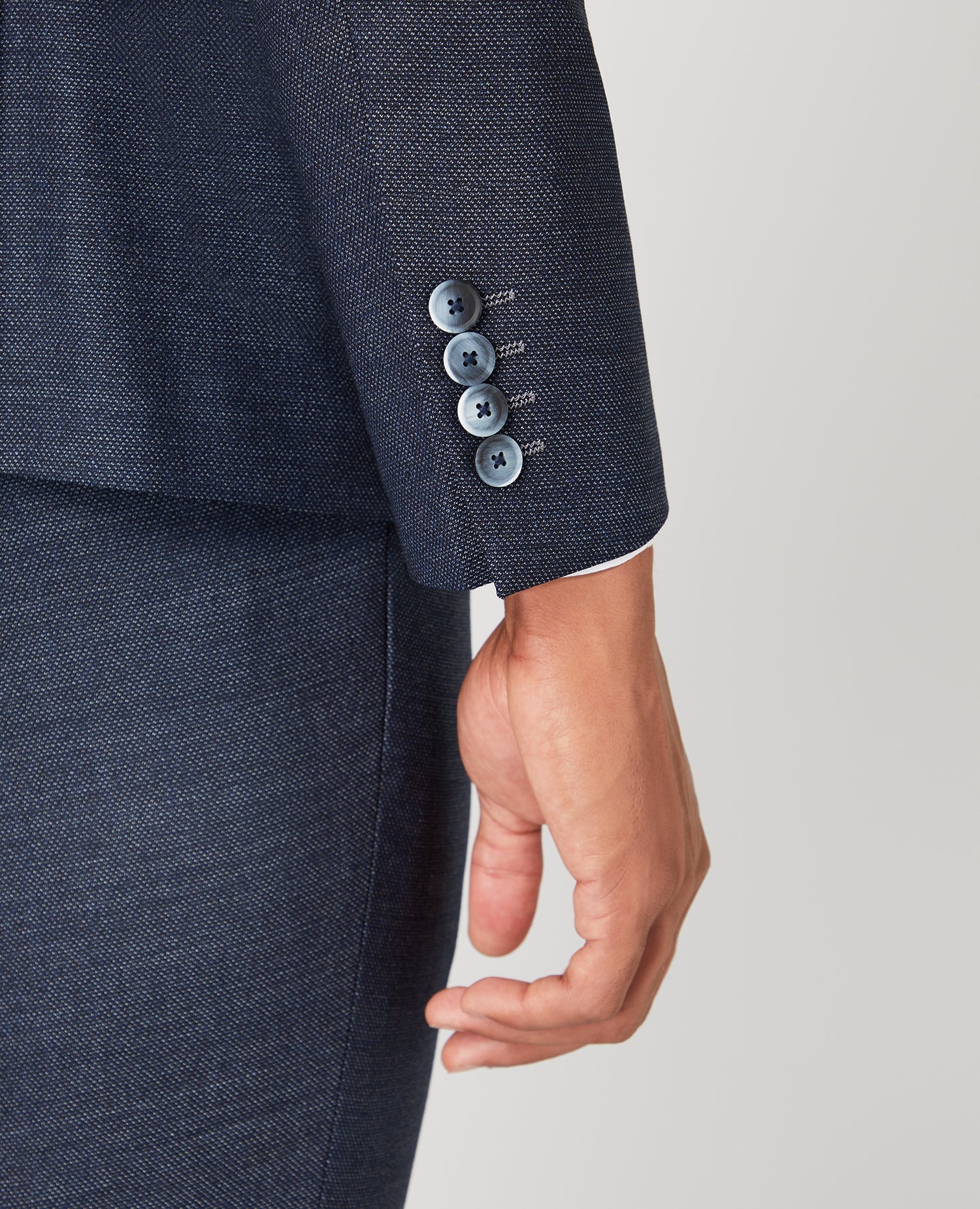 Man wearing a blue Slim Fit Wool-Rich Mix and Match Suit