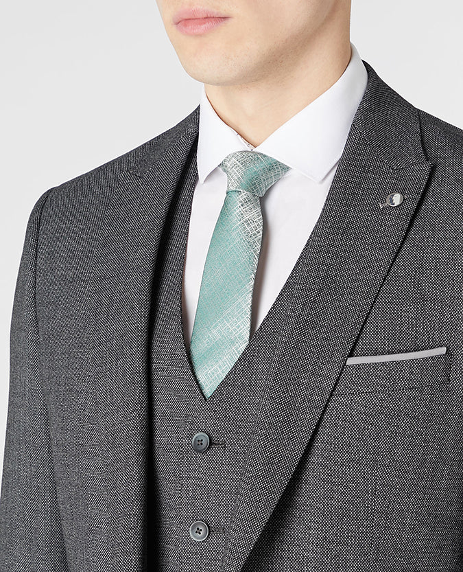 Man wearing a grey Mix and Match Suit Jacket