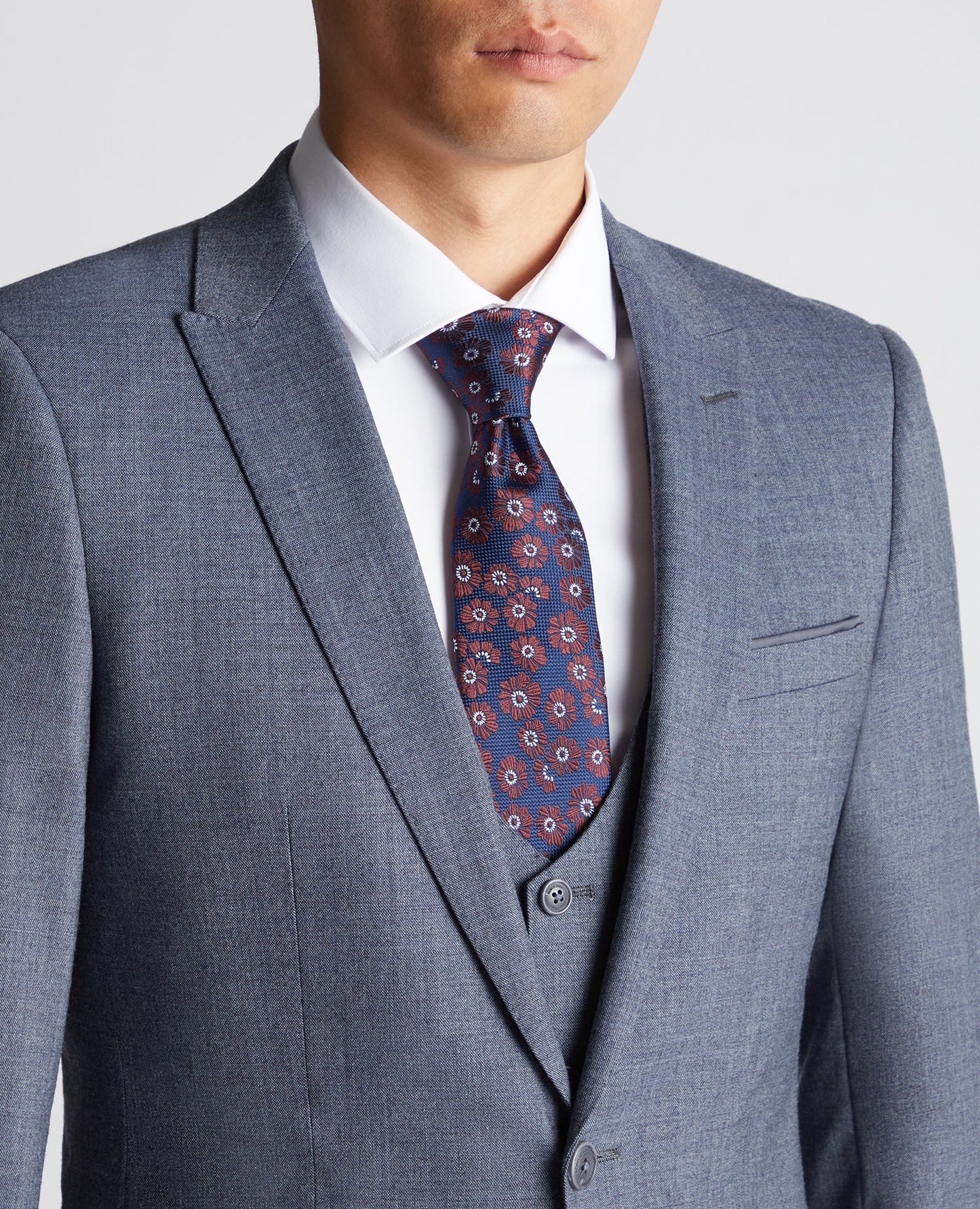 Man wearing a blue X-Slim Fit Wool Blend Mix And Match Suit Jacket