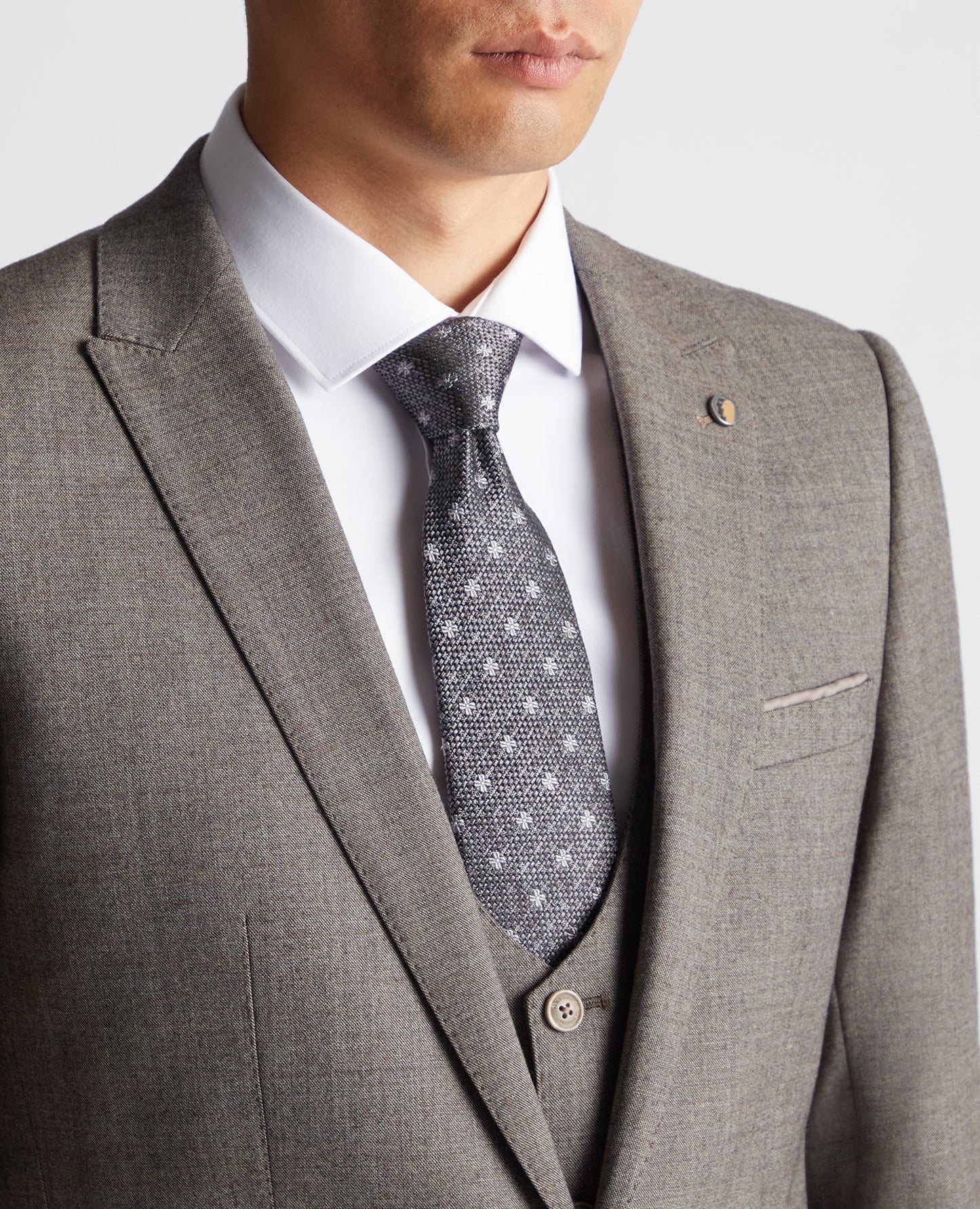 Man wearing a brown X-Slim Fit Wool Blend Mix And Match Suit