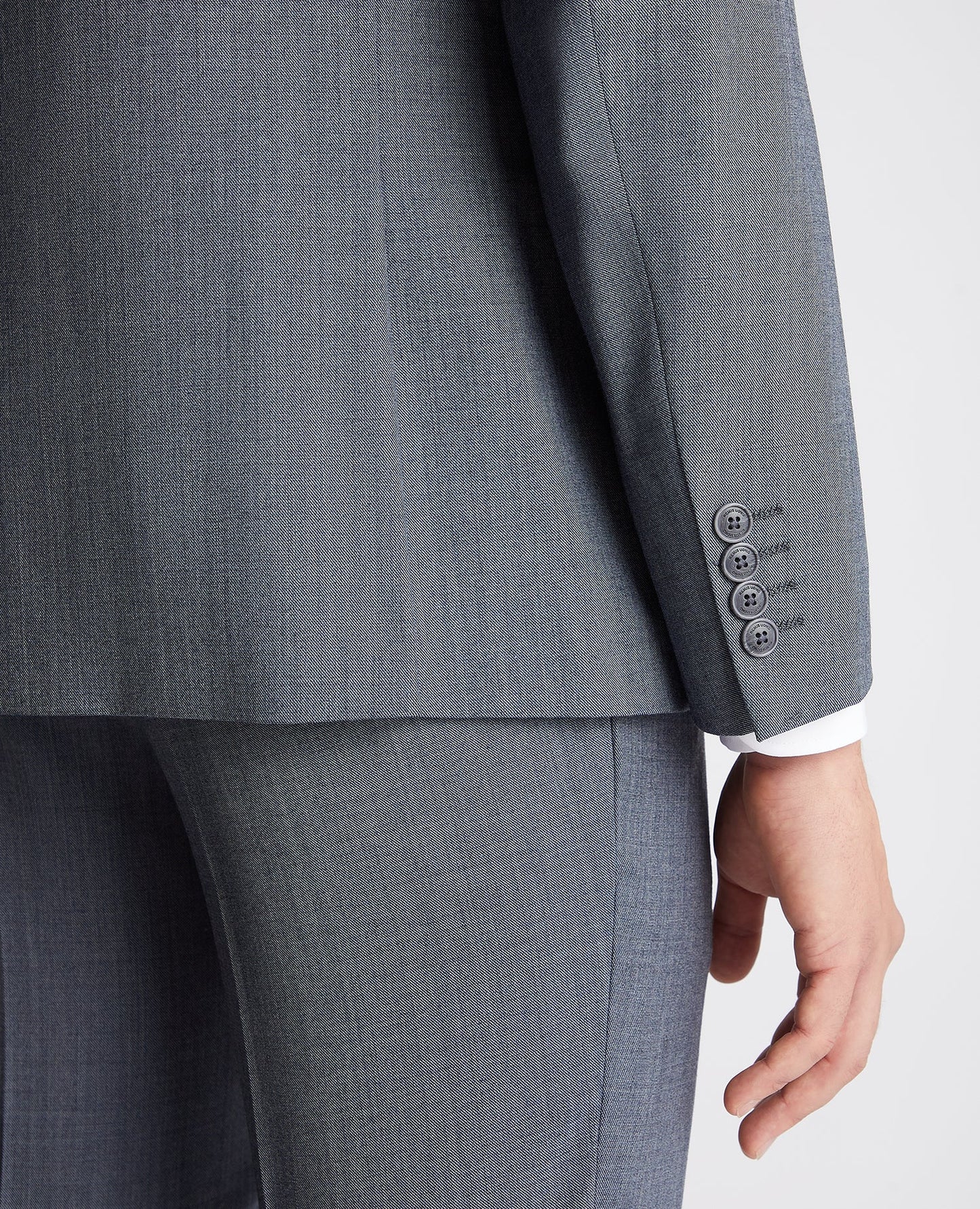 Man wearing a blue Tapered fit wool rich mix and match suit Jacket