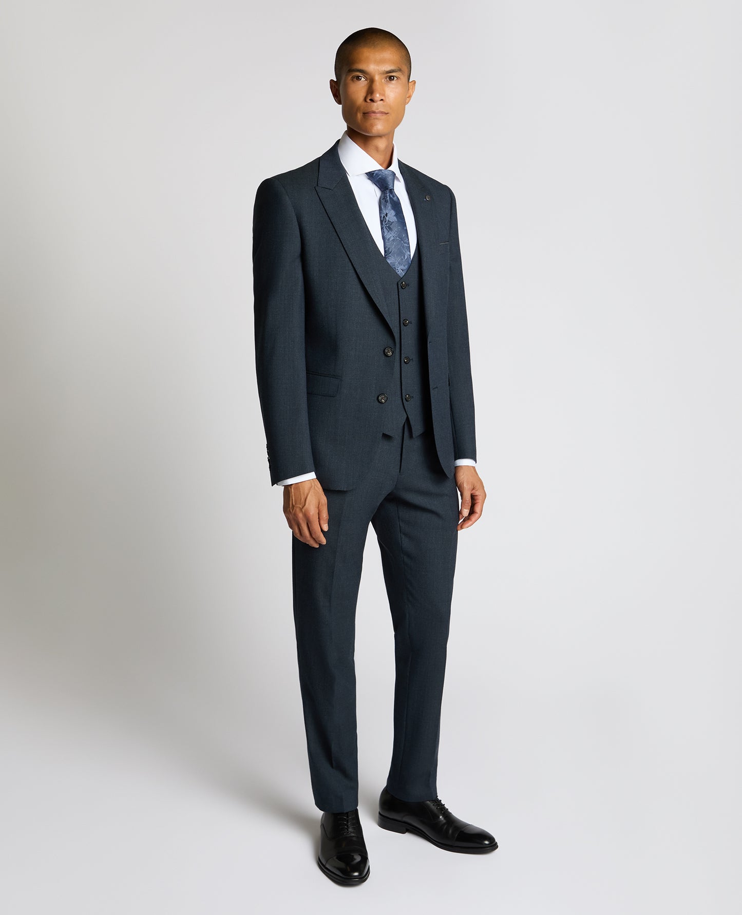 Man wearing a blue Slim Fit Wool Blend Suit