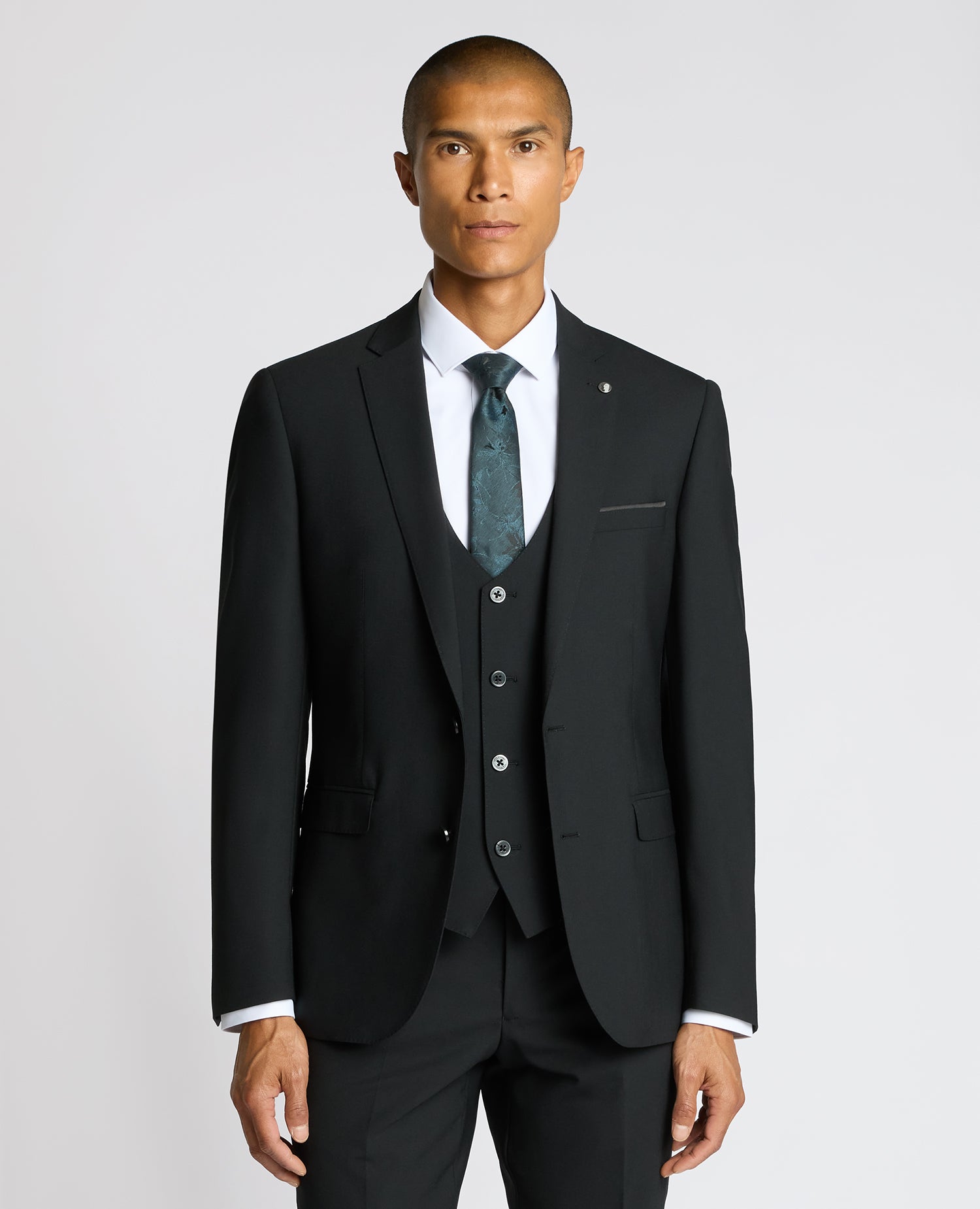 Man wearing a black Slim Fit Wool-Blend Suit