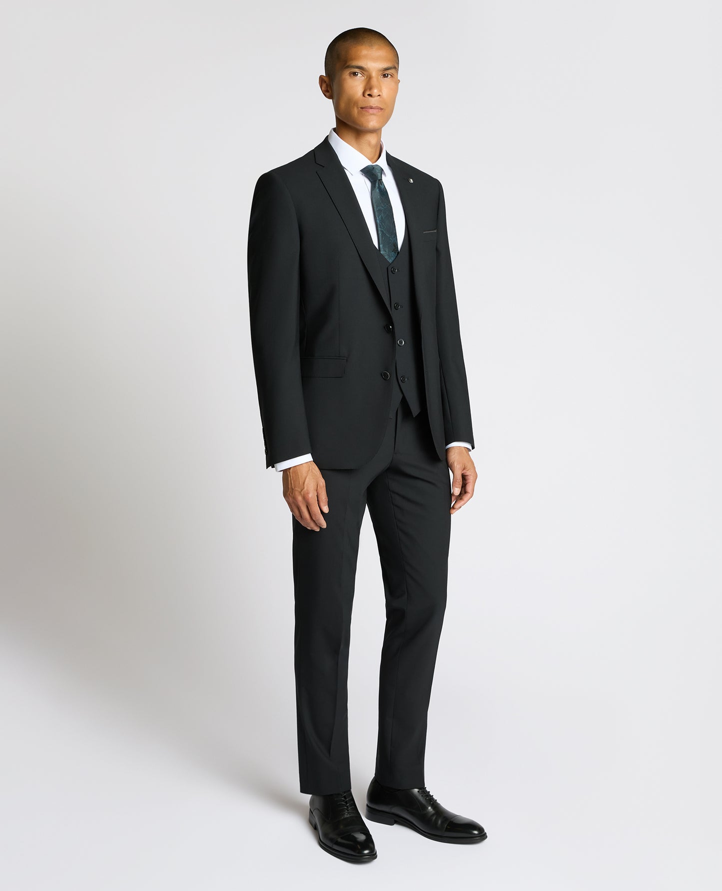Man wearing a black Slim Fit Wool-Blend Suit