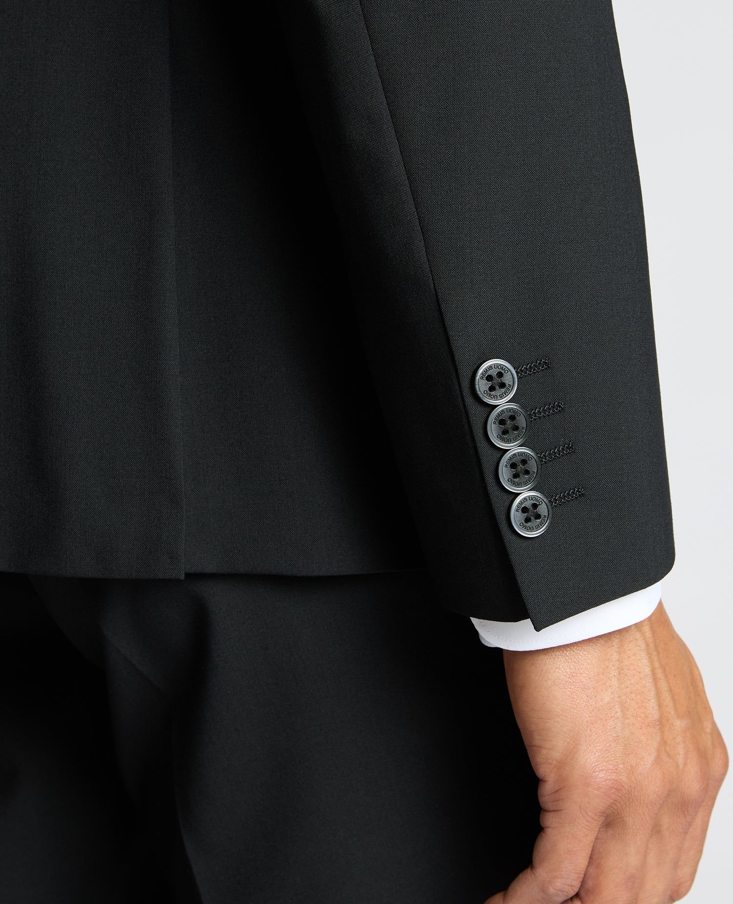 Man wearing a black Slim Fit Wool-Blend Suit